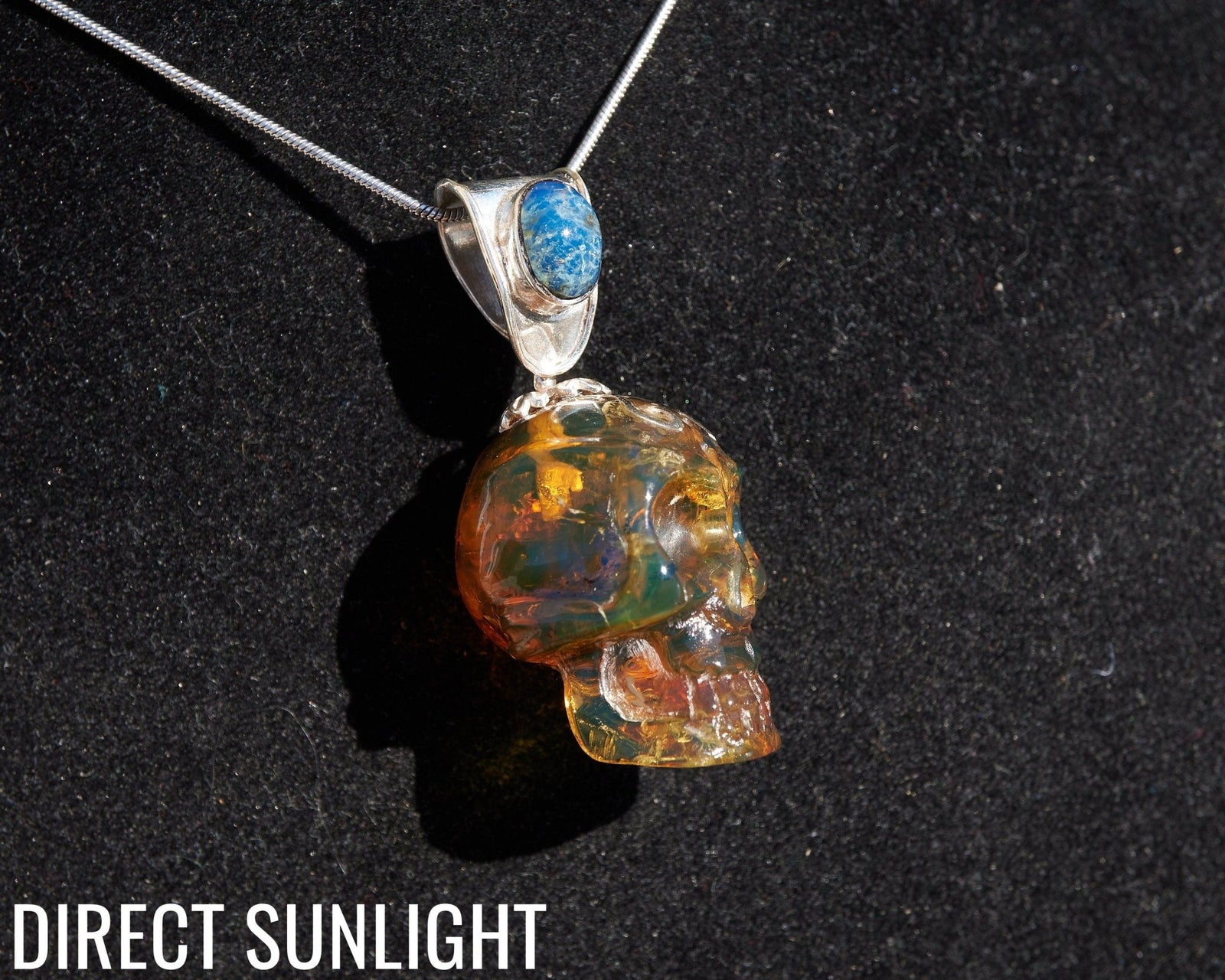 Blue & Green Dominican Amber Skull Pendant | 925 Silver - Larimar Creations