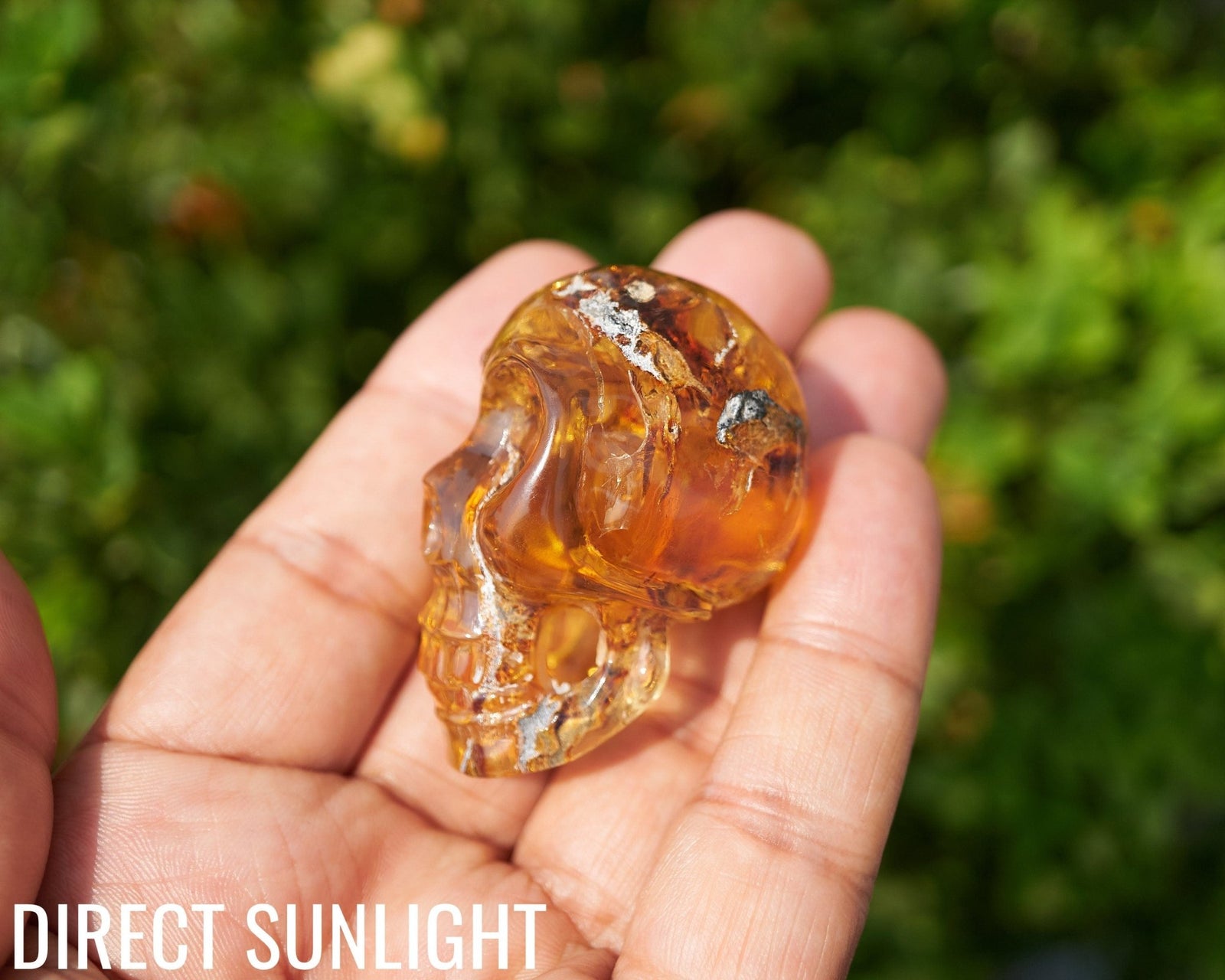 Dominican Amber Skull Carving - Authentic Green Amber - Larimar Creations