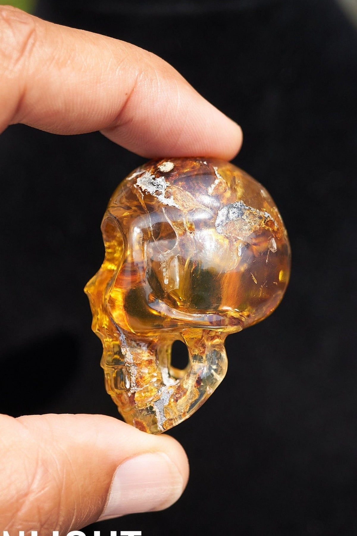 Dominican Amber Skull Carving - Authentic Green Amber - Larimar Creations