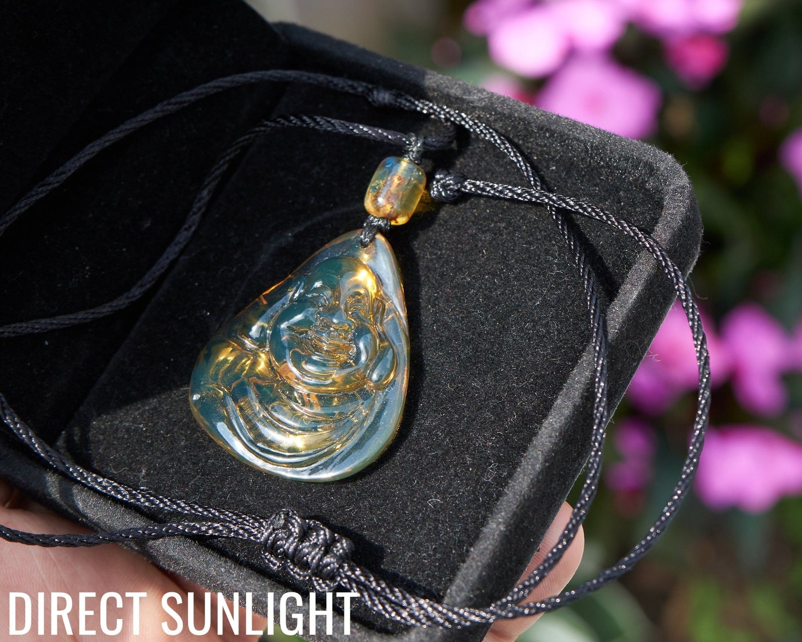 Dominican Blue Amber Buddha Pendant, Buddha Carving. - Larimar Creations