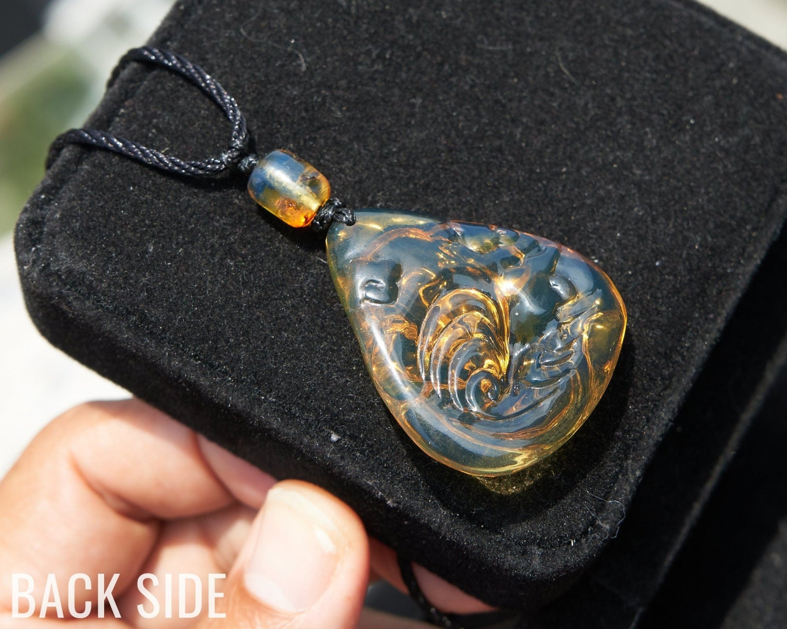 Dominican Blue Amber Buddha Pendant, Buddha Carving. - Larimar Creations