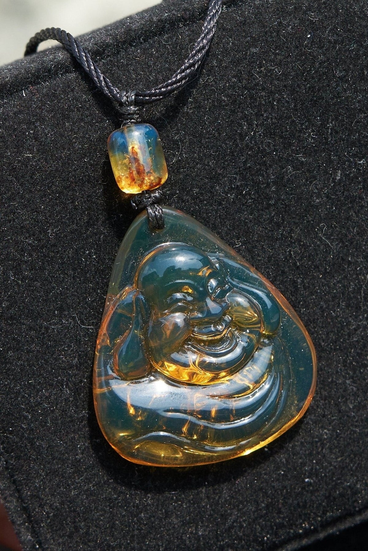 Dominican Blue Amber Buddha Pendant, Buddha Carving. - Larimar Creations