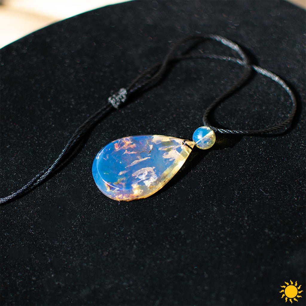 Dominican Blue Amber Cabochon Teardrop Pendant - Larimar Creations