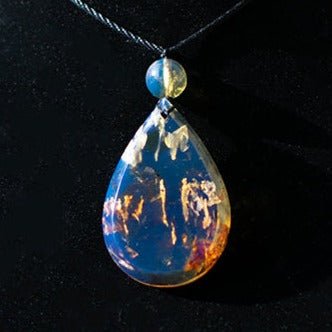 Dominican Blue Amber Cabochon Teardrop Pendant - Larimar Creations