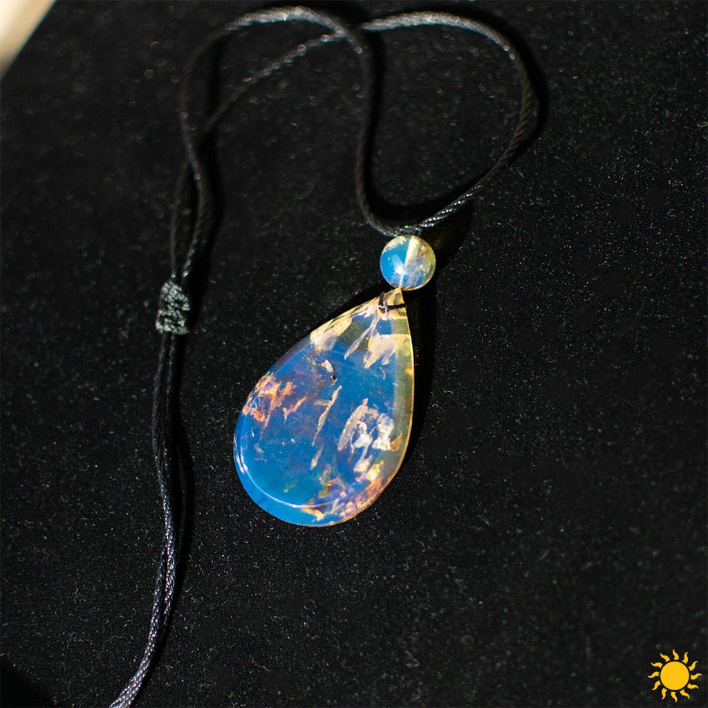 Dominican Blue Amber Cabochon Teardrop Pendant - Larimar Creations