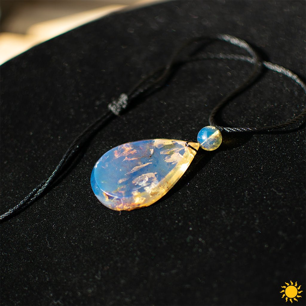 Dominican Blue Amber Cabochon Teardrop Pendant - Larimar Creations