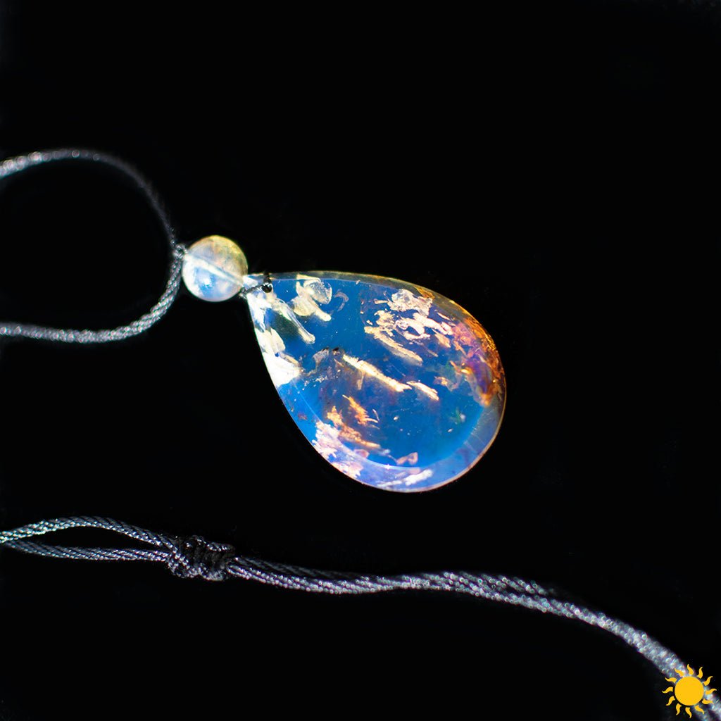 Dominican Blue Amber Cabochon Teardrop Pendant - Larimar Creations
