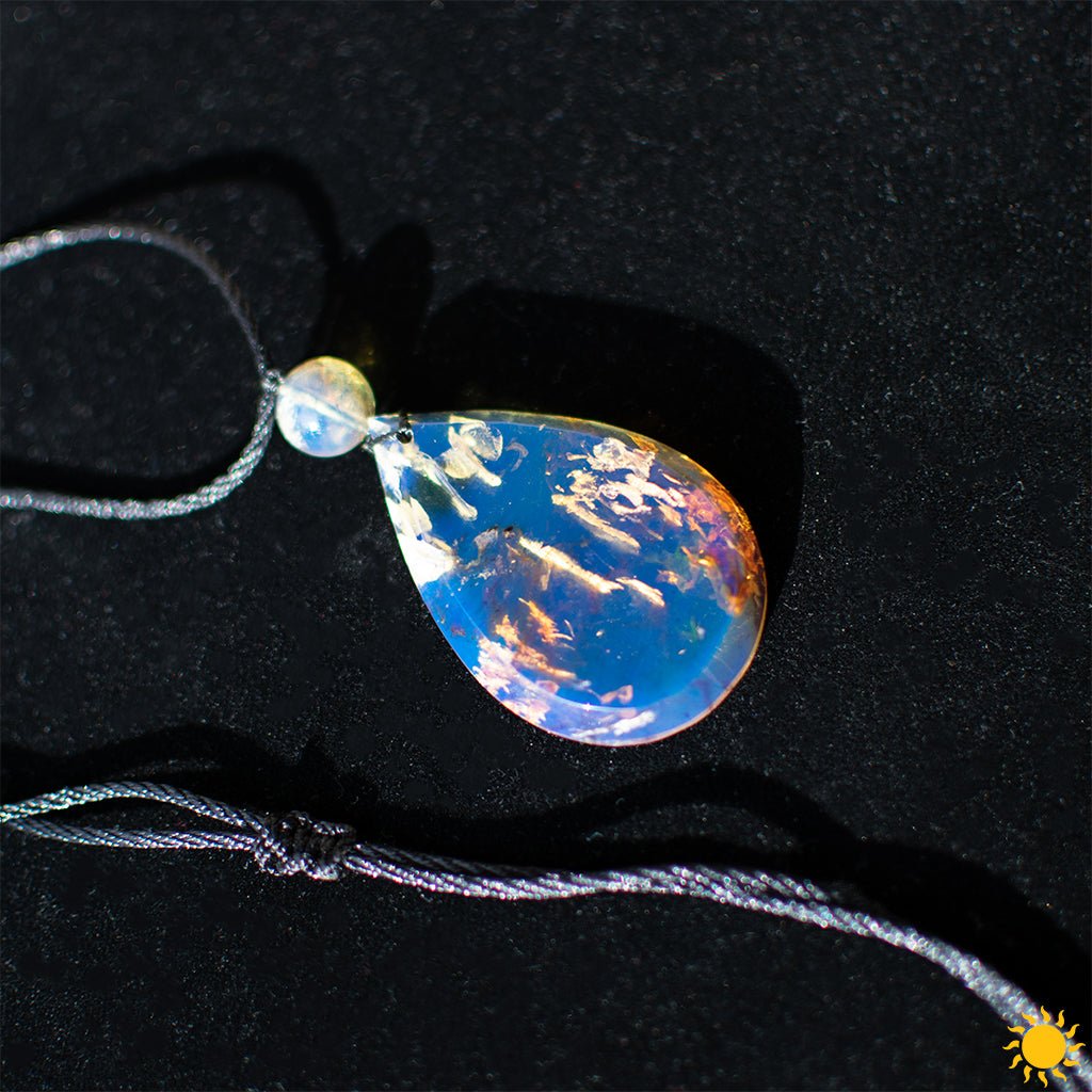 Dominican Blue Amber Cabochon Teardrop Pendant - Larimar Creations