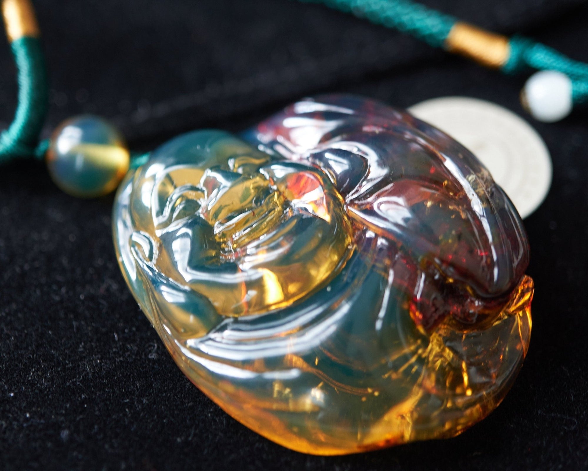 Dominican Blue Amber Happy Buddha Pendant - Larimar Creations
