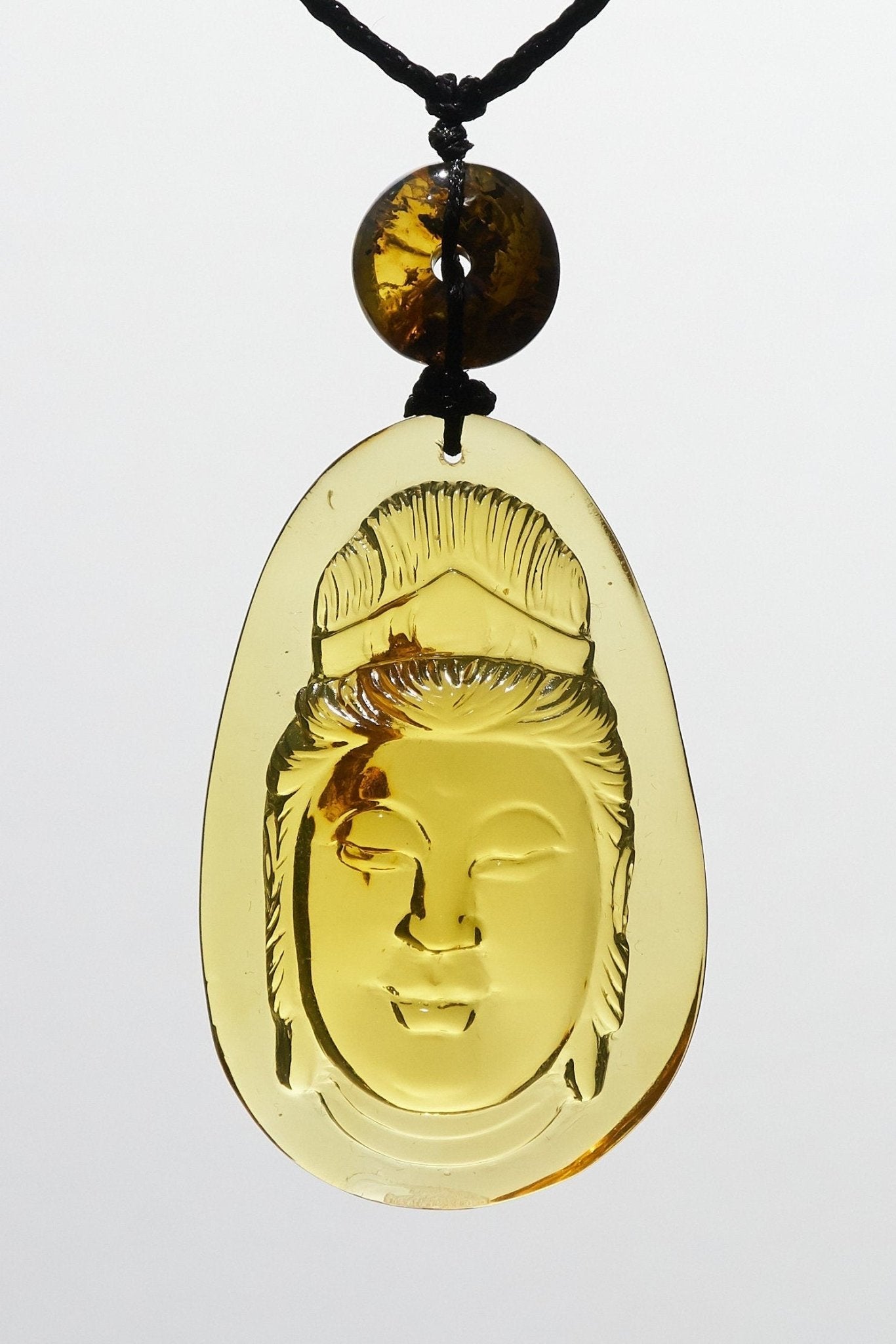Dominican Blue Amber Kwan Yin Pendant, Meditation Necklace - Larimar Creations