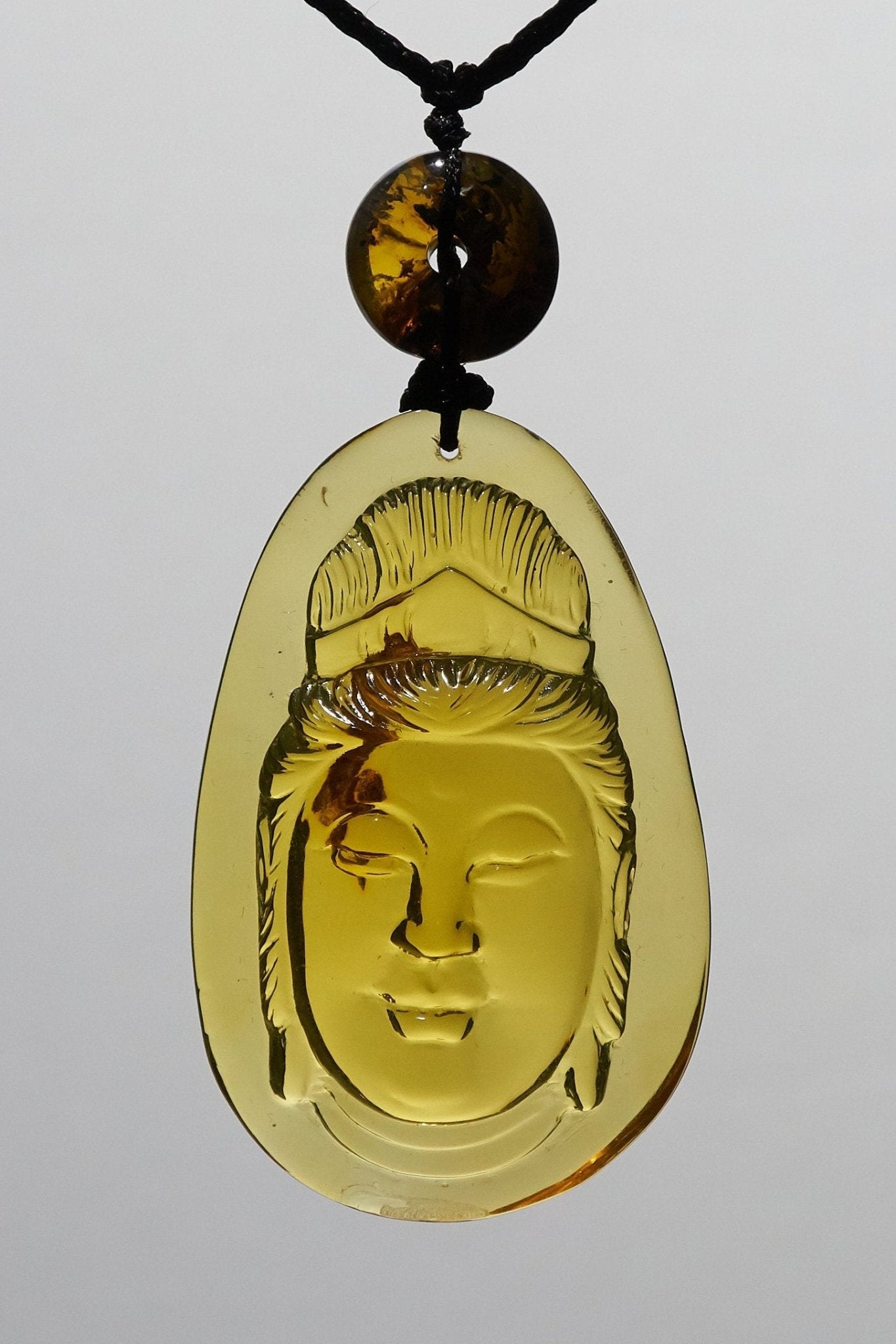 Dominican Blue Amber Kwan Yin Pendant, Meditation Necklace - Larimar Creations