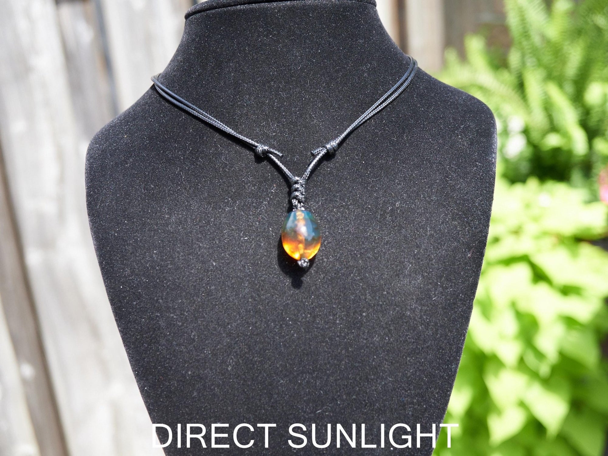 Blue amber adjustable pendant, dominican blue amber leather necklace