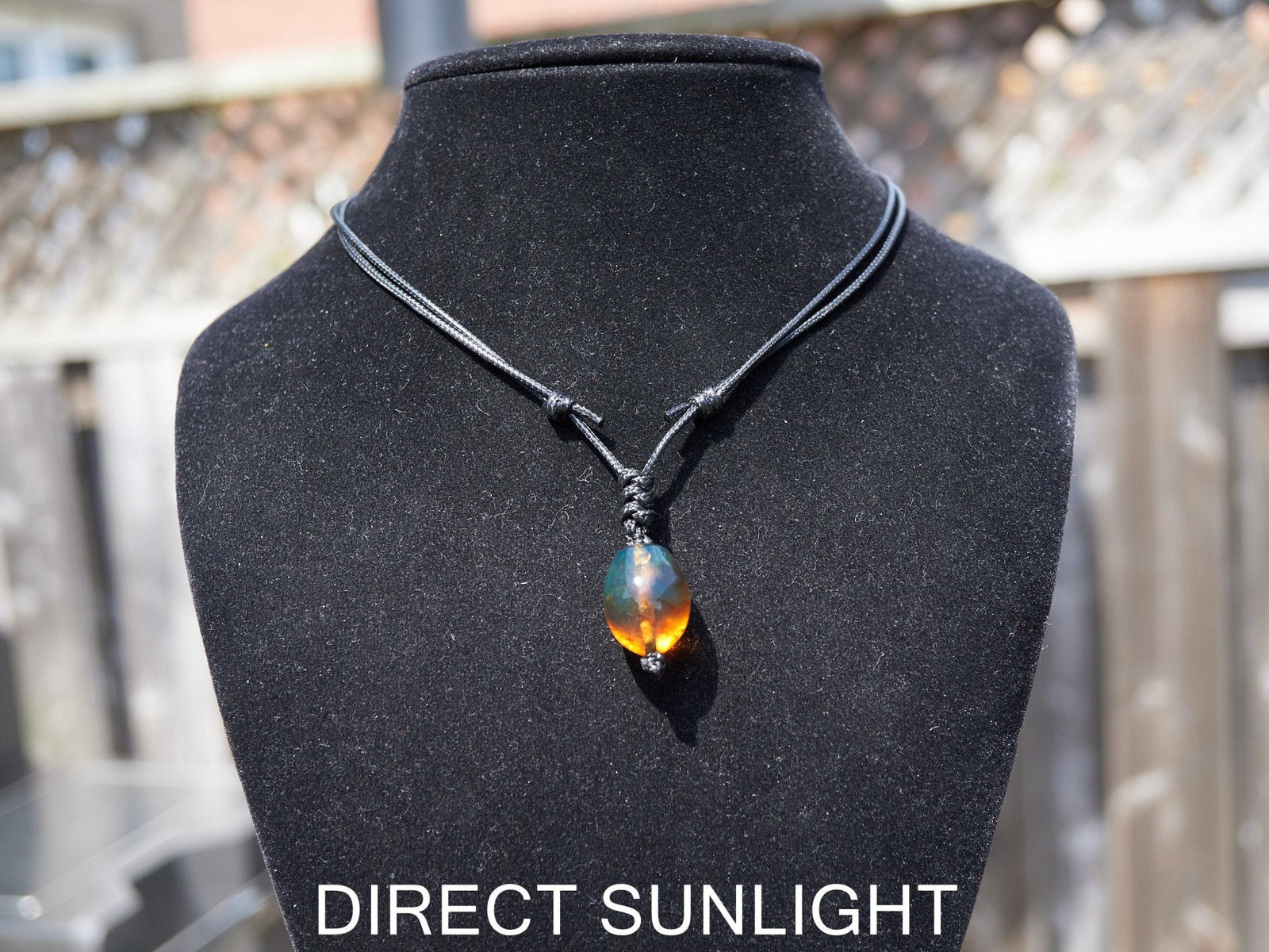Blue amber adjustable pendant, dominican blue amber leather necklace
