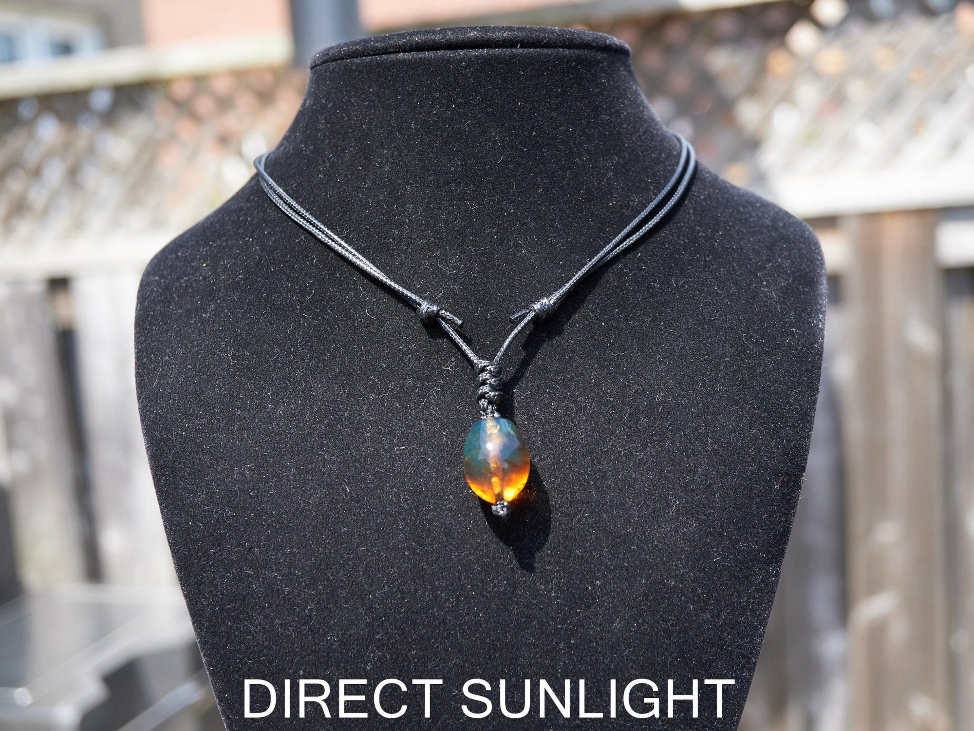 Blue amber adjustable pendant, dominican blue amber leather necklace