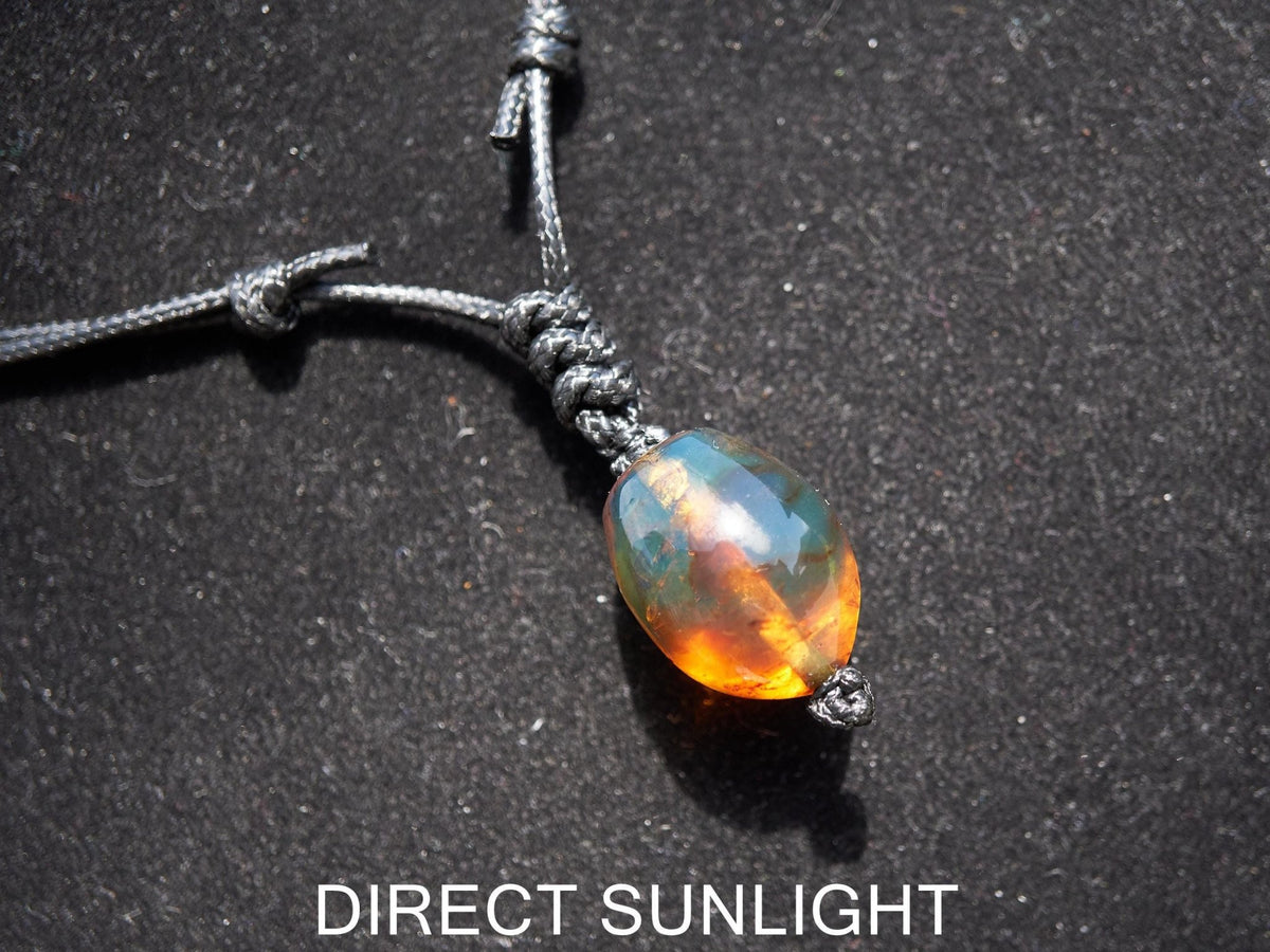 Blue amber adjustable pendant, dominican blue amber leather necklace