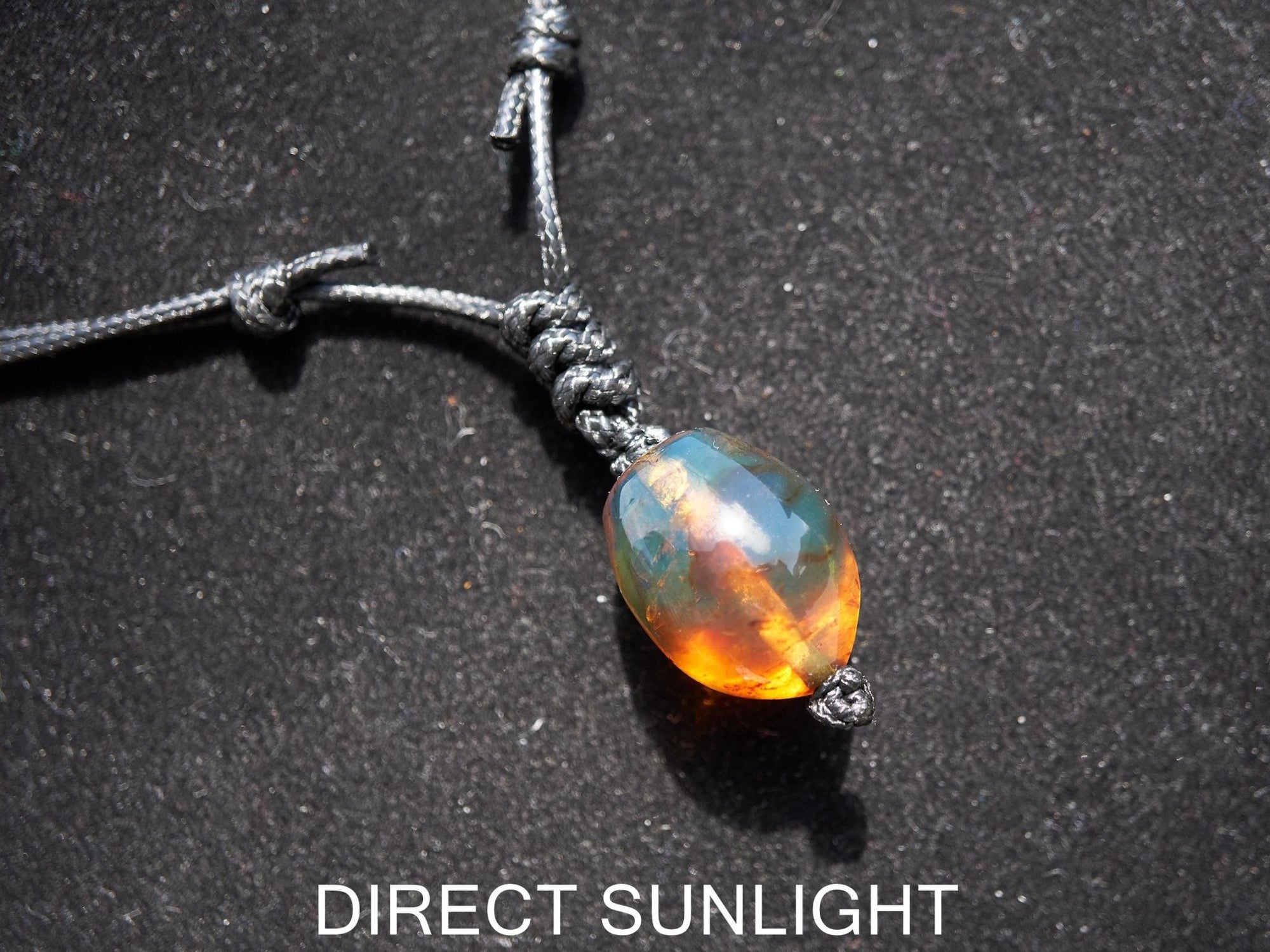 Blue amber adjustable pendant, dominican blue amber leather necklace