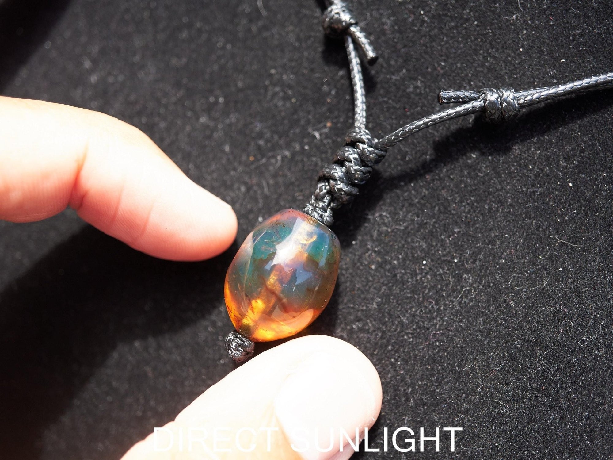 Blue amber adjustable pendant, dominican blue amber leather necklace