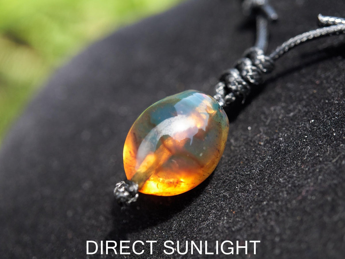 Blue amber adjustable pendant, dominican blue amber leather necklace