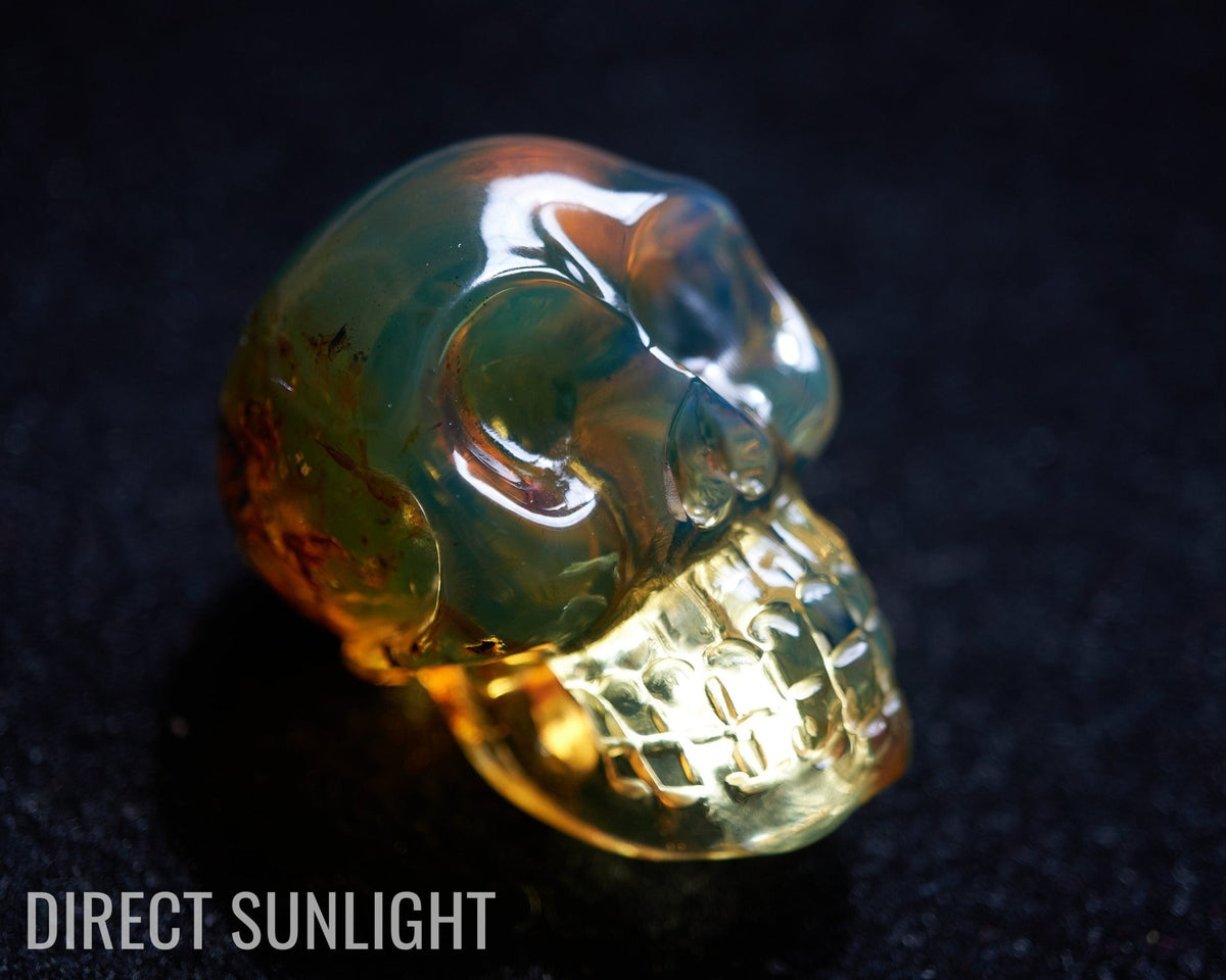 Dominican Blue Amber Skull - Handmade Natural Carving - Larimar Creations