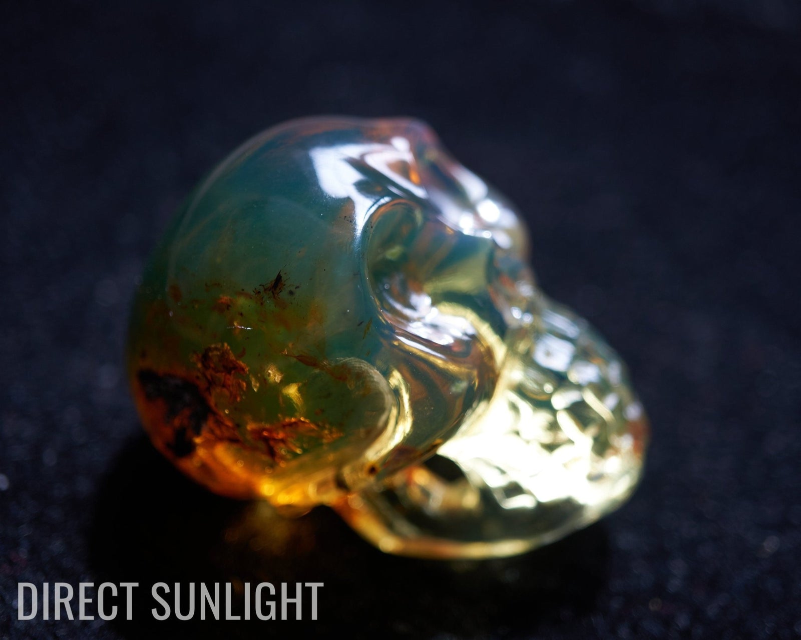Dominican Blue Amber Skull - Handmade Natural Carving - Larimar Creations