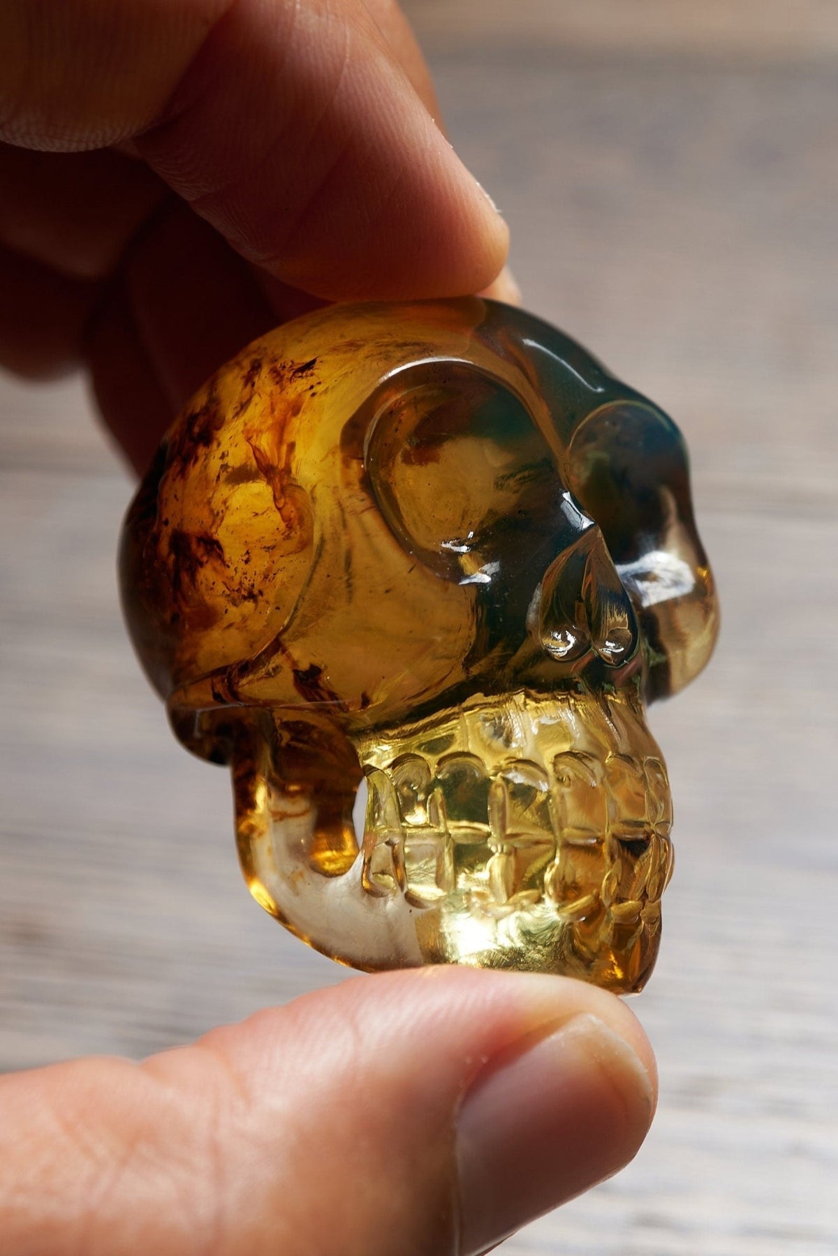Dominican Blue Amber Skull - Handmade Natural Carving - Larimar Creations