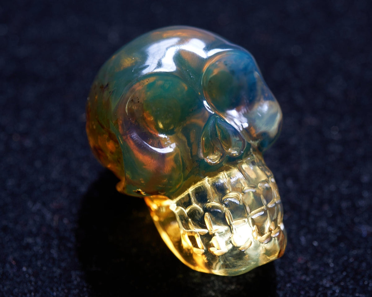 Dominican Blue Amber Skull - Handmade Natural Carving - Larimar Creations
