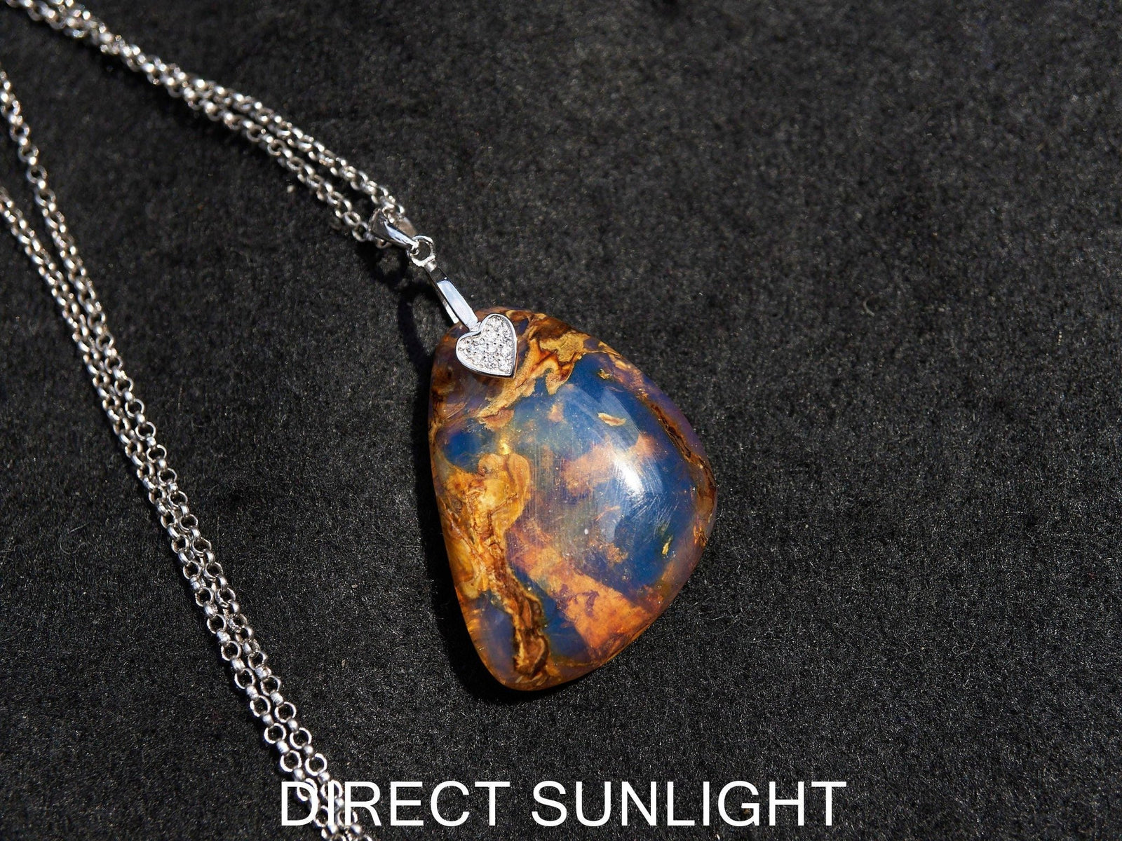 Dominican Blue Amber Teardrop Pendant - 925 Sterling Silver - Larimar Creations