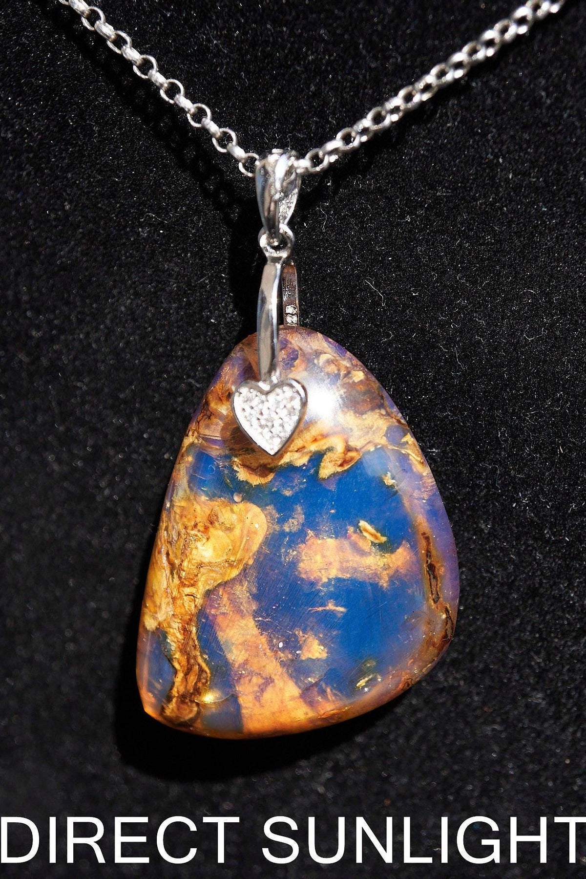Dominican Blue Amber Teardrop Pendant - 925 Sterling Silver - Larimar Creations