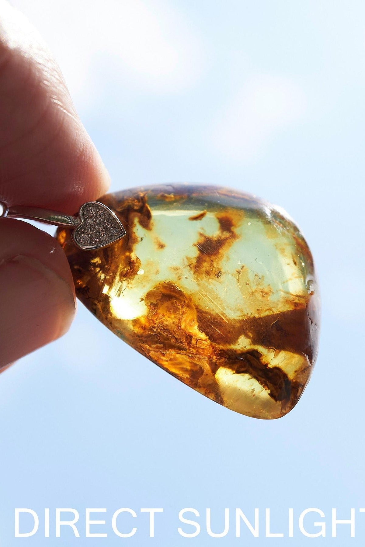 Dominican Blue Amber Teardrop Pendant - 925 Sterling Silver - Larimar Creations