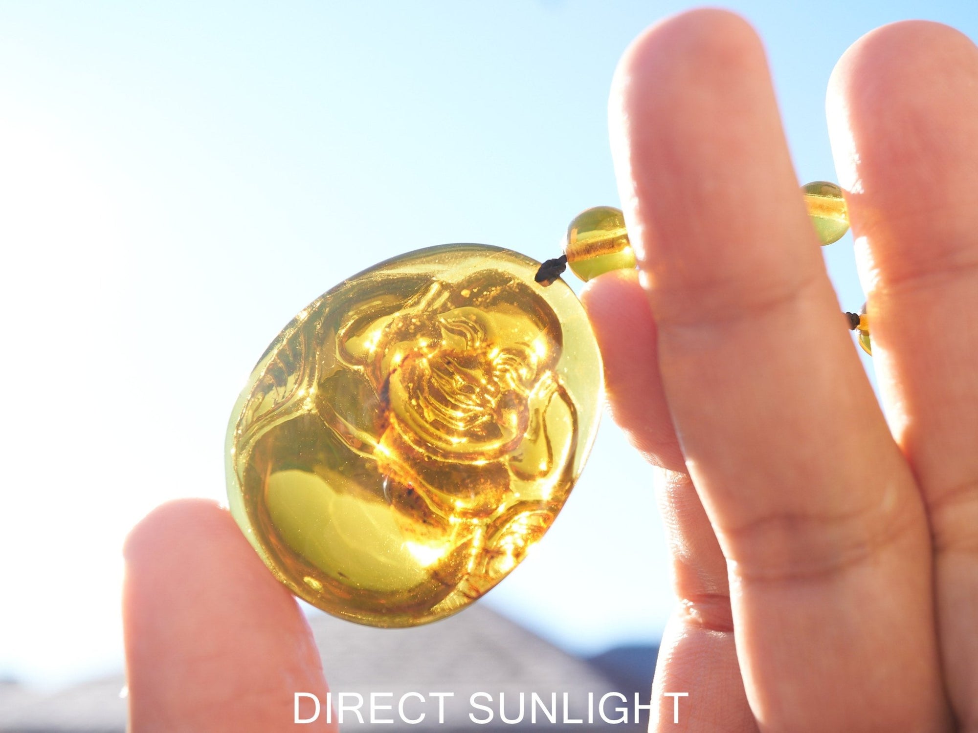 Dominican Green Amber Buddha Necklace - Larimar Creations