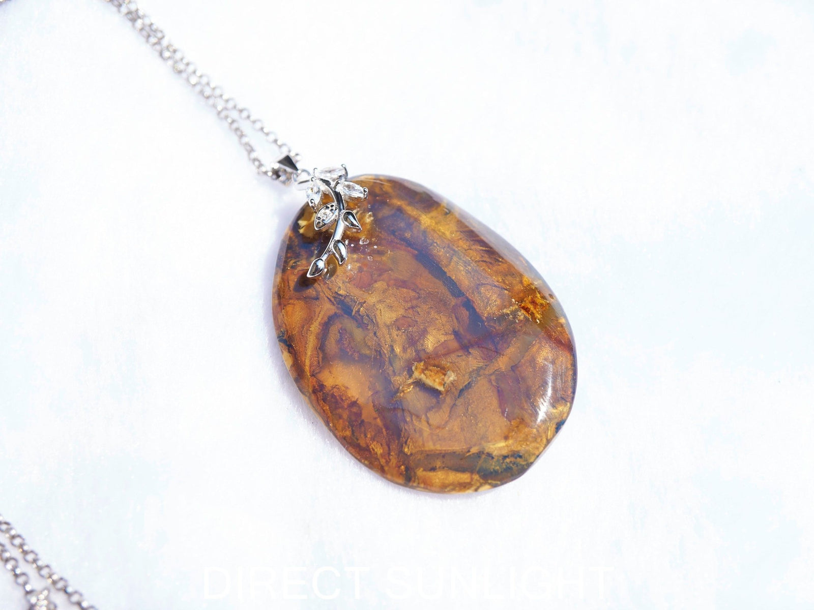 Genuine Dominican Blue Amber Jewelry with Bail in 925 Sterling Silver - Larimar Creations