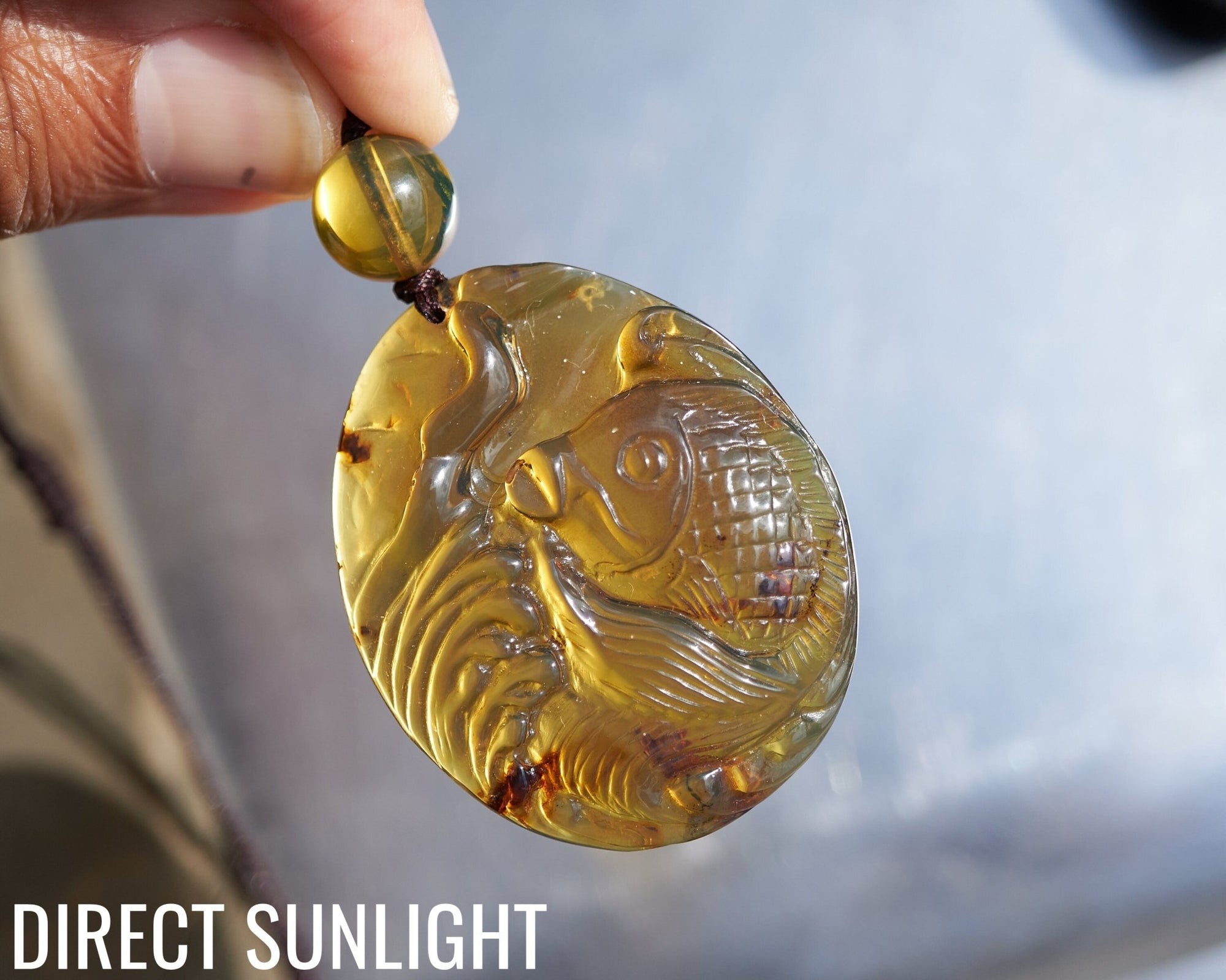 Hand - Carved Blue Dominican Amber Koi Fish Pendant | Adjustable Necklace - Larimar Creations