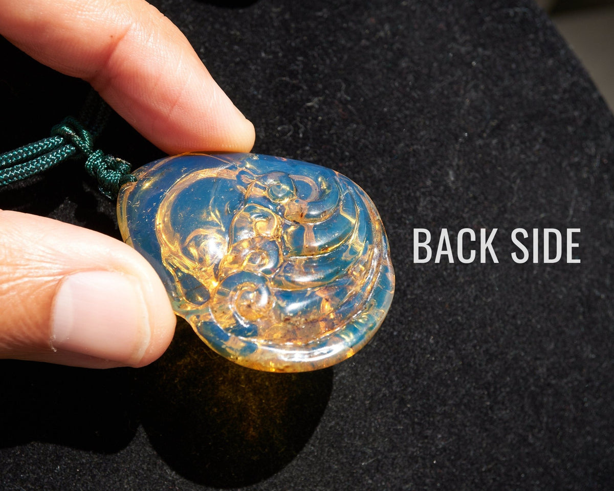 Hand - Carved Dominican Amber Laughing Buddha Pendant | Spiritual Jewelry - Larimar Creations