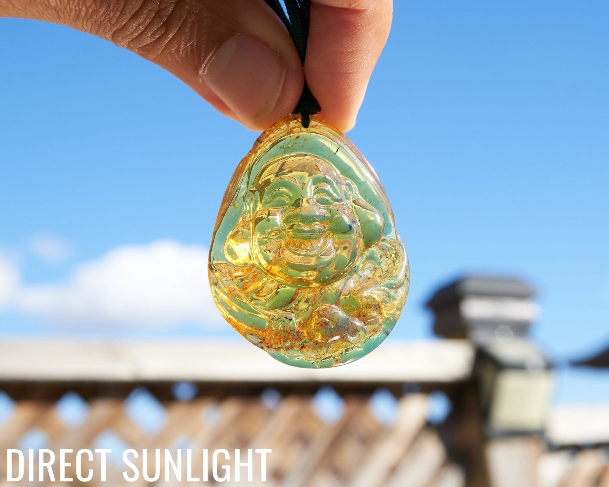 Hand - Carved Dominican Amber Laughing Buddha Pendant | Spiritual Jewelry - Larimar Creations