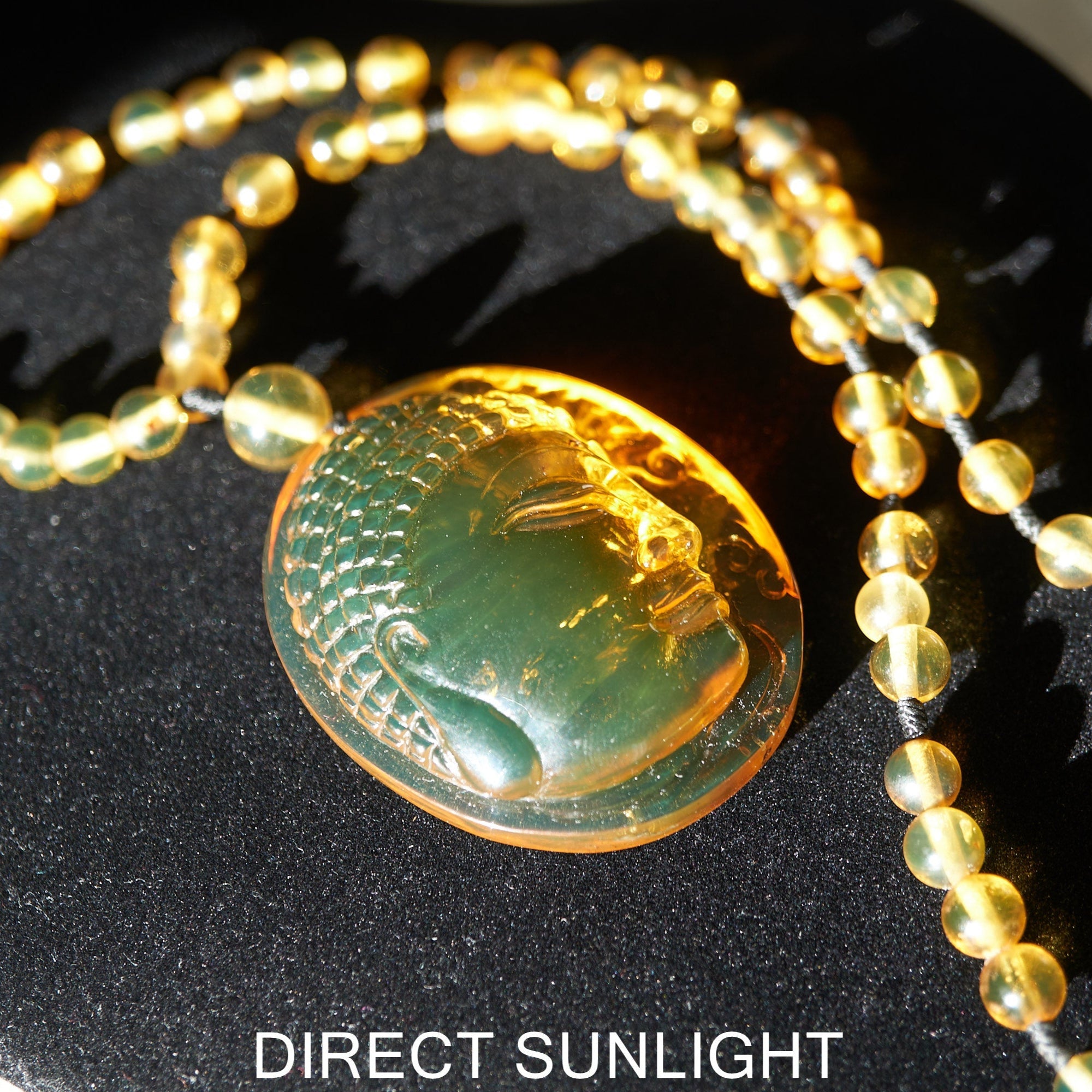 Handcrafted Dominican Amber Beaded Necklace with Buddha Pendant - Larimar Creations