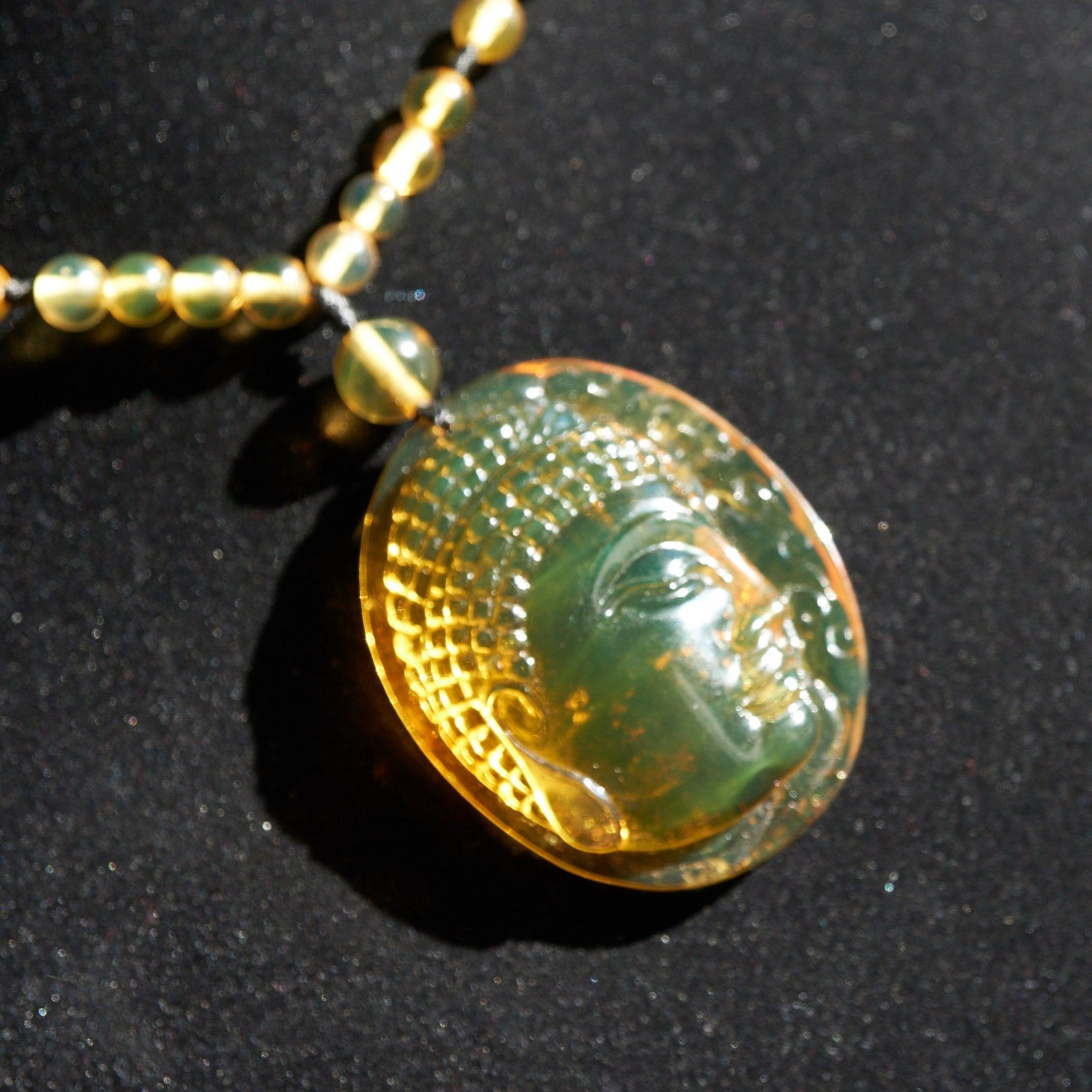 Handcrafted Dominican Amber Beaded Necklace with Buddha Pendant - Larimar Creations
