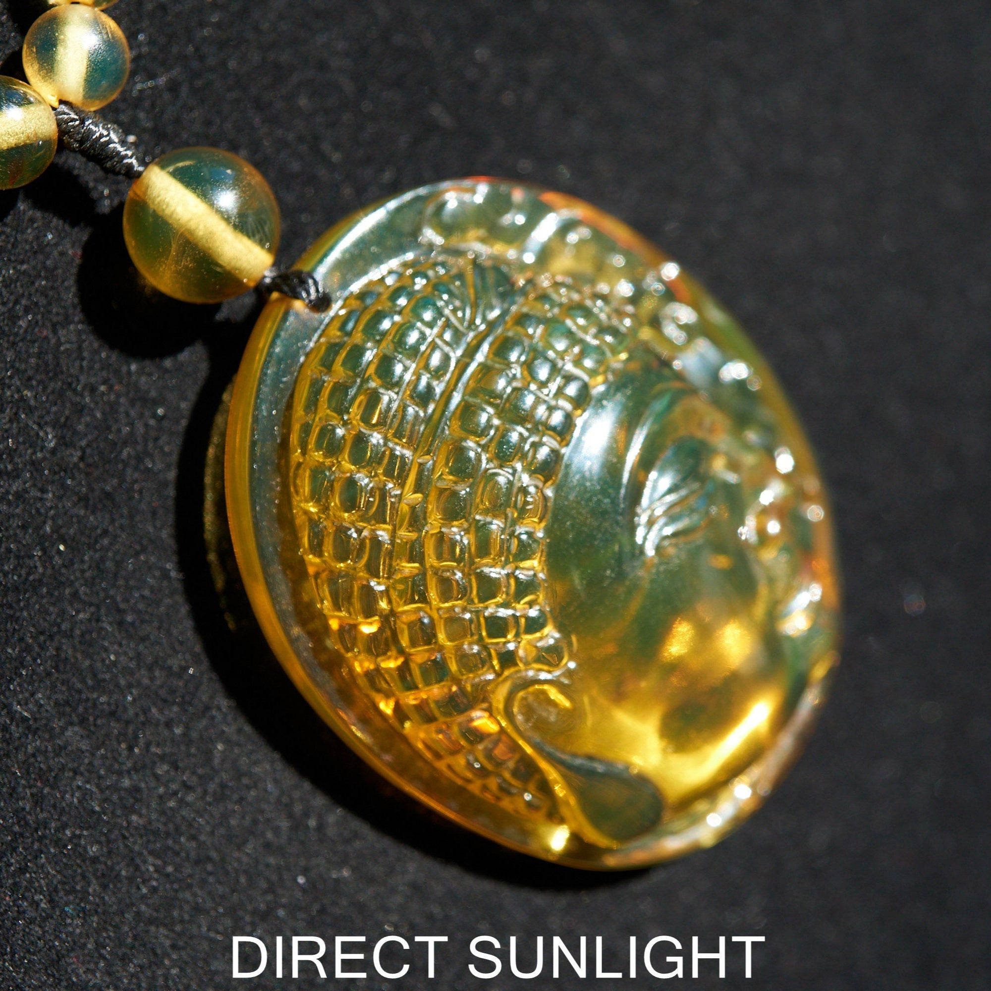 Handcrafted Dominican Amber Beaded Necklace with Buddha Pendant - Larimar Creations