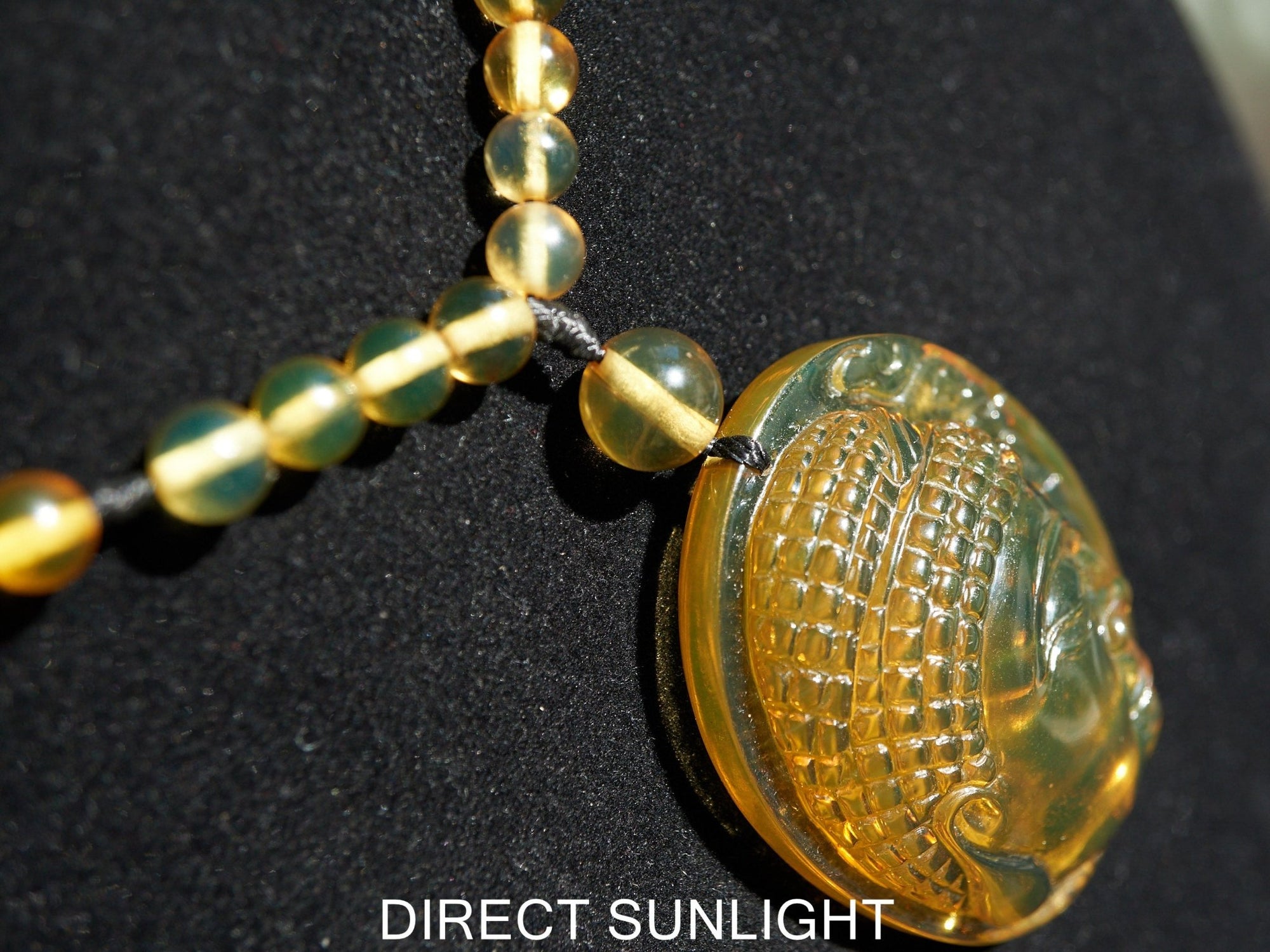 Handcrafted Dominican Amber Beaded Necklace with Buddha Pendant - Larimar Creations