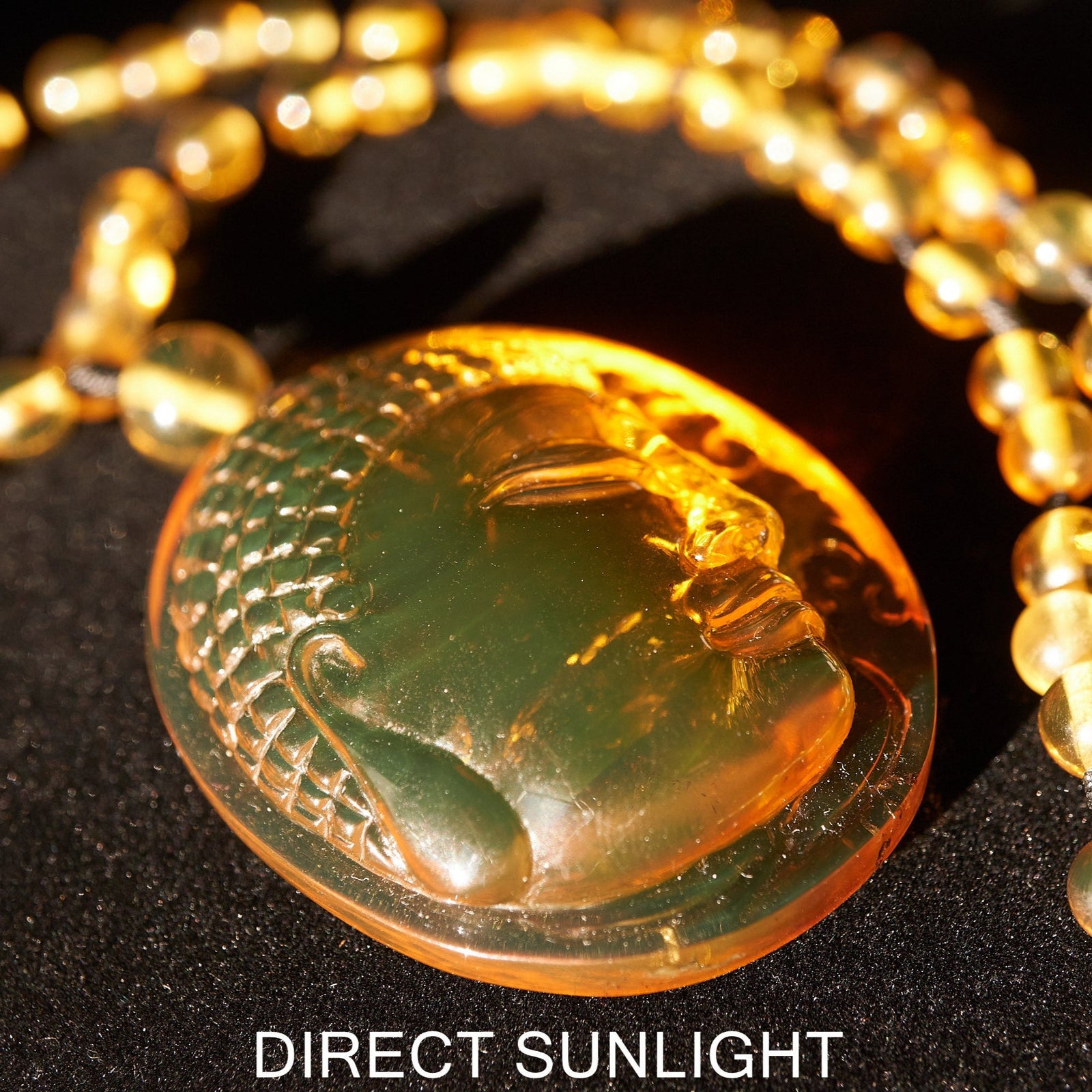 Handcrafted Dominican Amber Beaded Necklace with Buddha Pendant - Larimar Creations