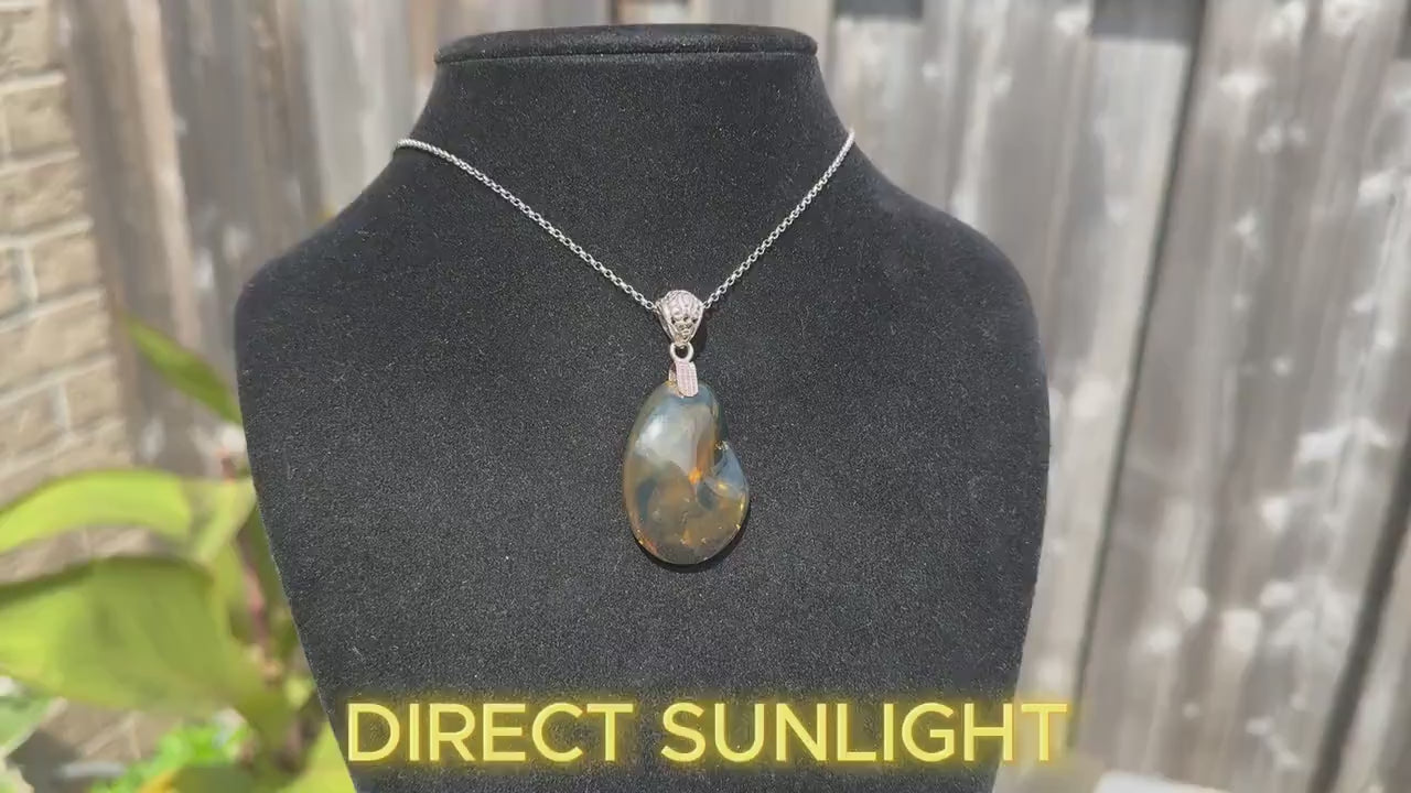 Rare blue amber pendant sourced from the Dominican Republic, 925 sterling silver bail, genuine Dominican blue amber necklace, natural amber