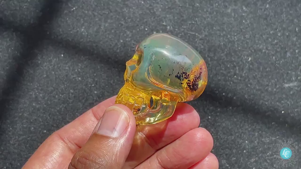 Authentic natural green blue amber dominican skull handmade carving, dominican green Blue amber skull carving realistic skull carving