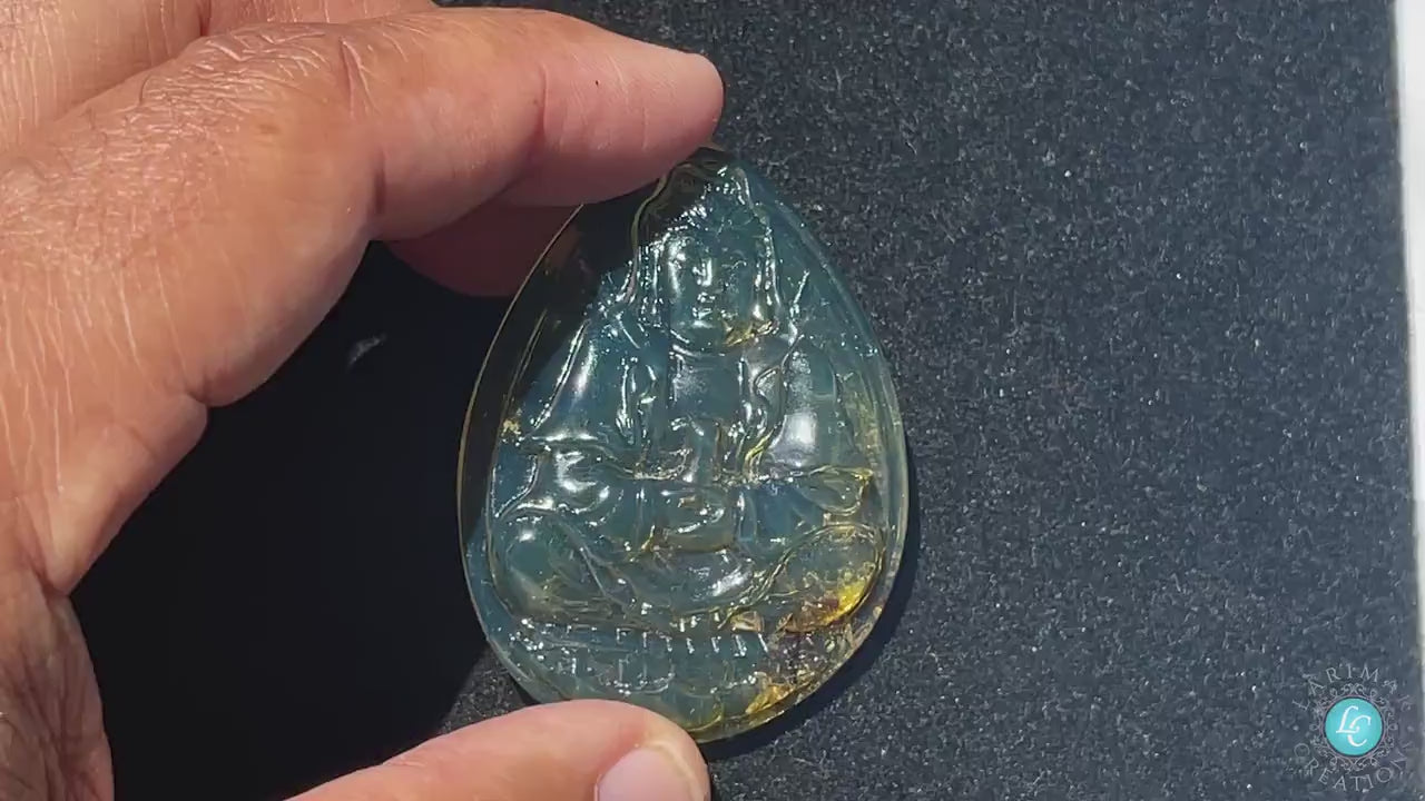 Buddha Blue amber Dominican blue amber siting on a Lotus flower Authentic Dominican Blue Amber Pendant Dharma
