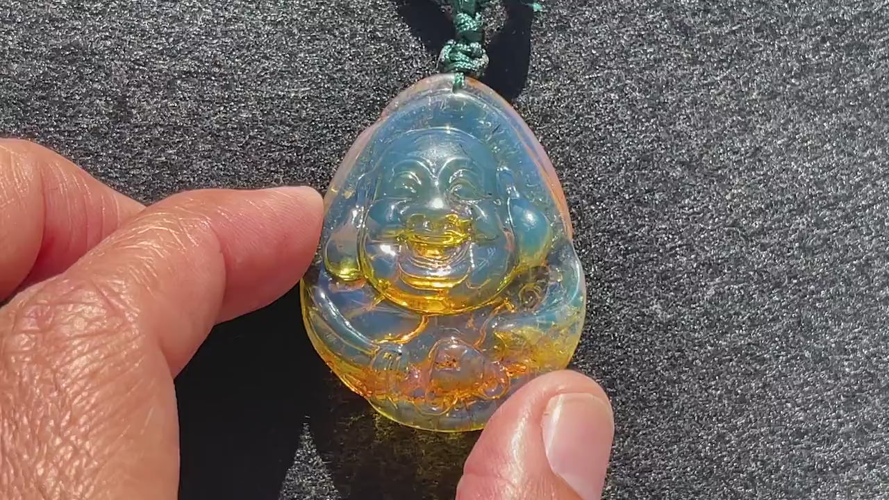 Hand-Carved Happy Buddha Pendant in Genuine Dominican Blue Amber – Unique Artisan Jewelry for Prosperity & Joy