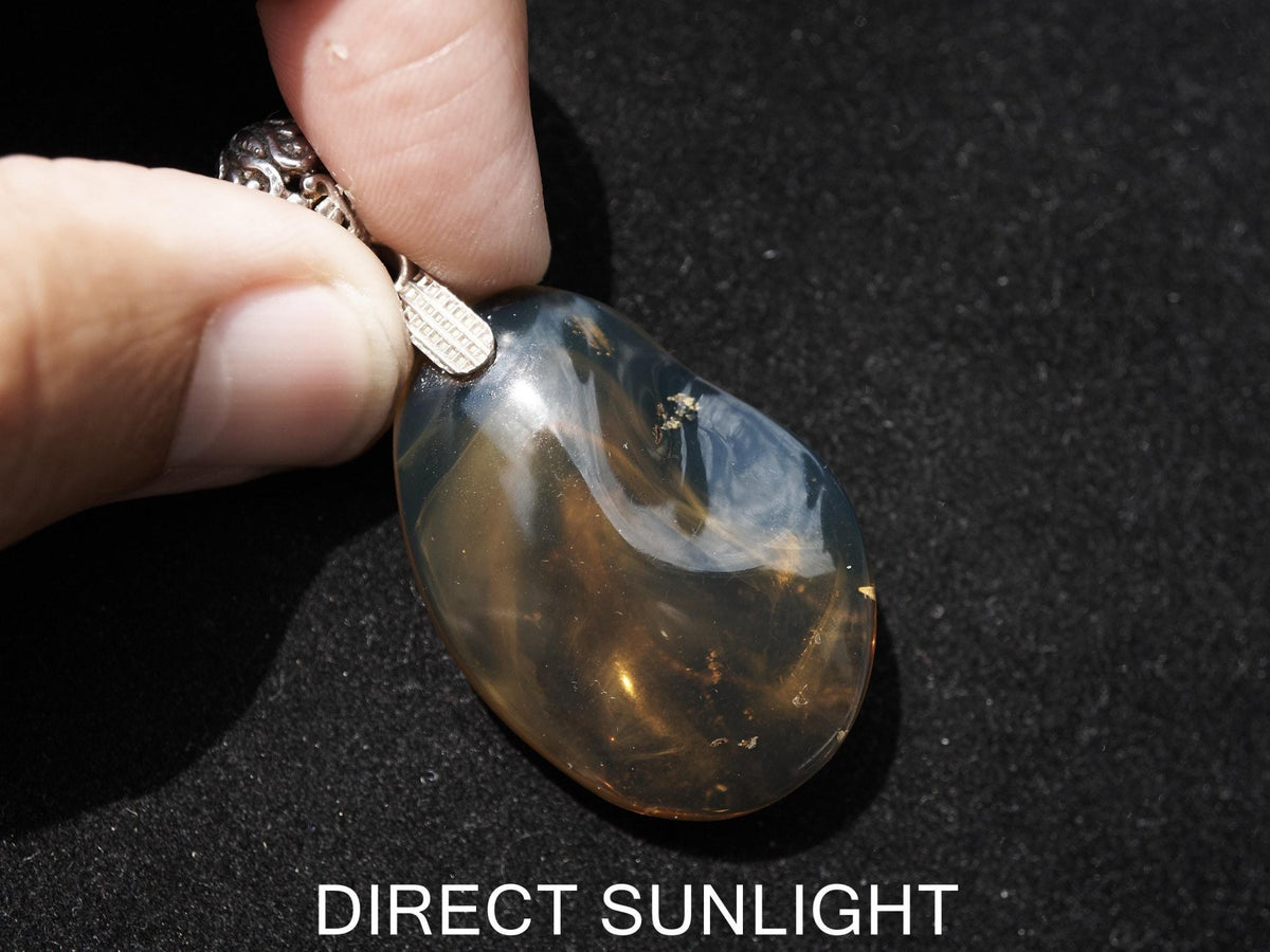 Rare Blue Amber Pendant - 925 Sterling Silver Bail - Larimar Creations