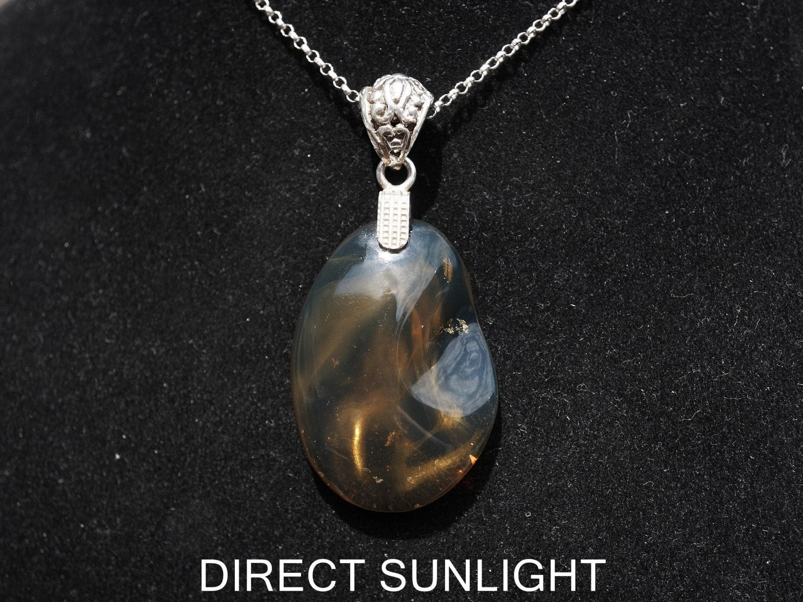 Rare Blue Amber Pendant - 925 Sterling Silver Bail - Larimar Creations