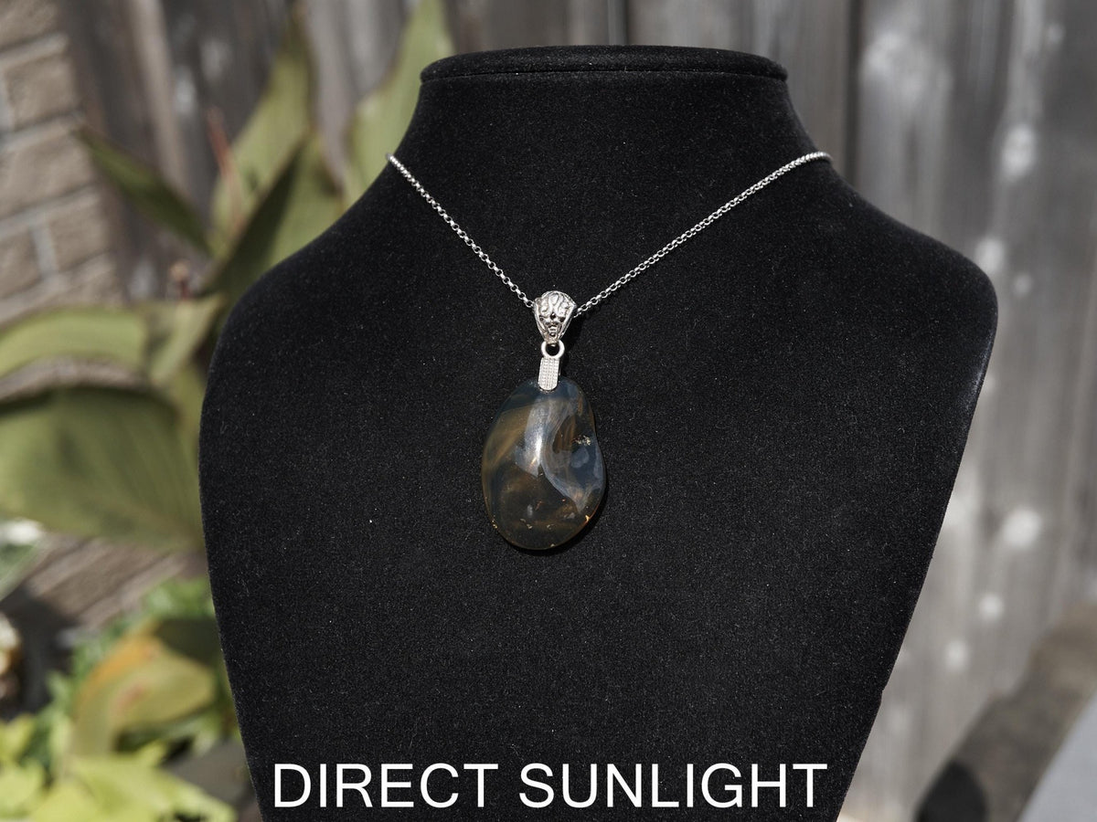 Rare Blue Amber Pendant - 925 Sterling Silver Bail - Larimar Creations