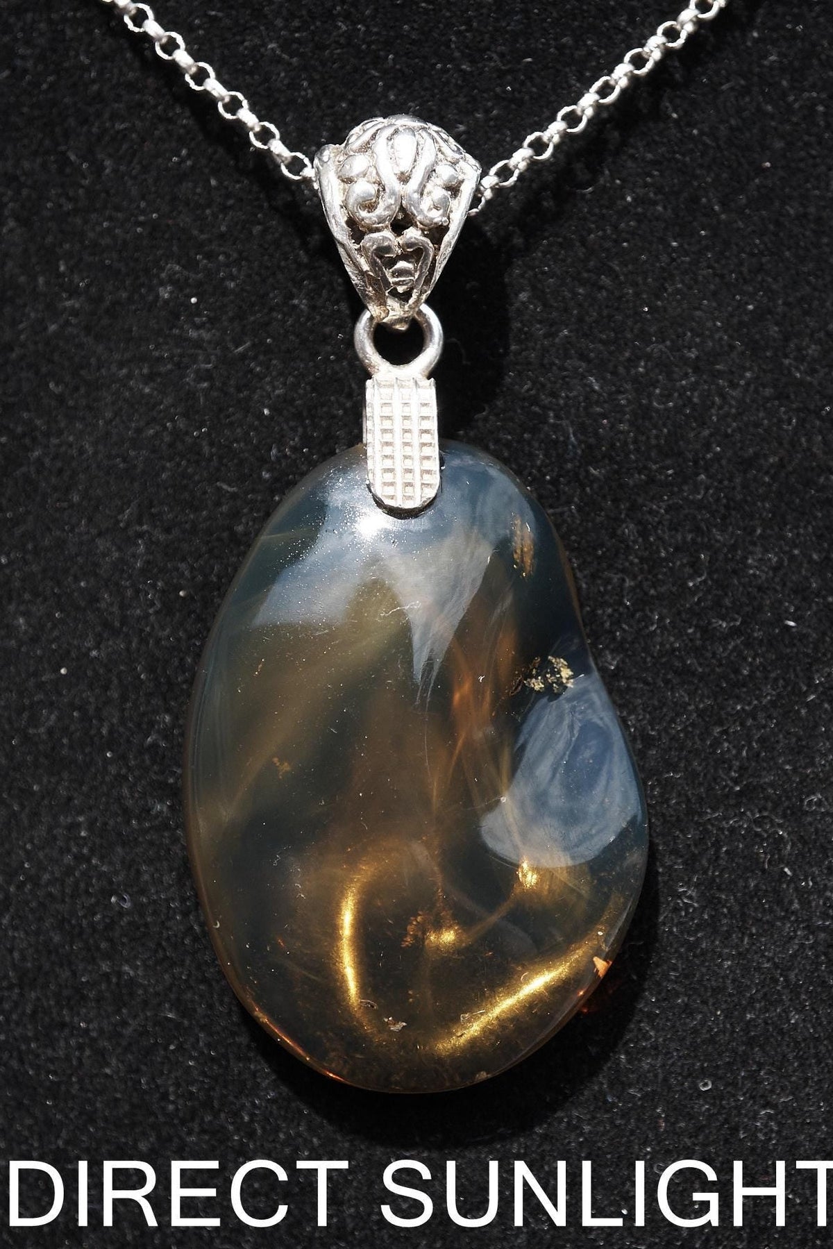 Rare Blue Amber Pendant - 925 Sterling Silver Bail - Larimar Creations