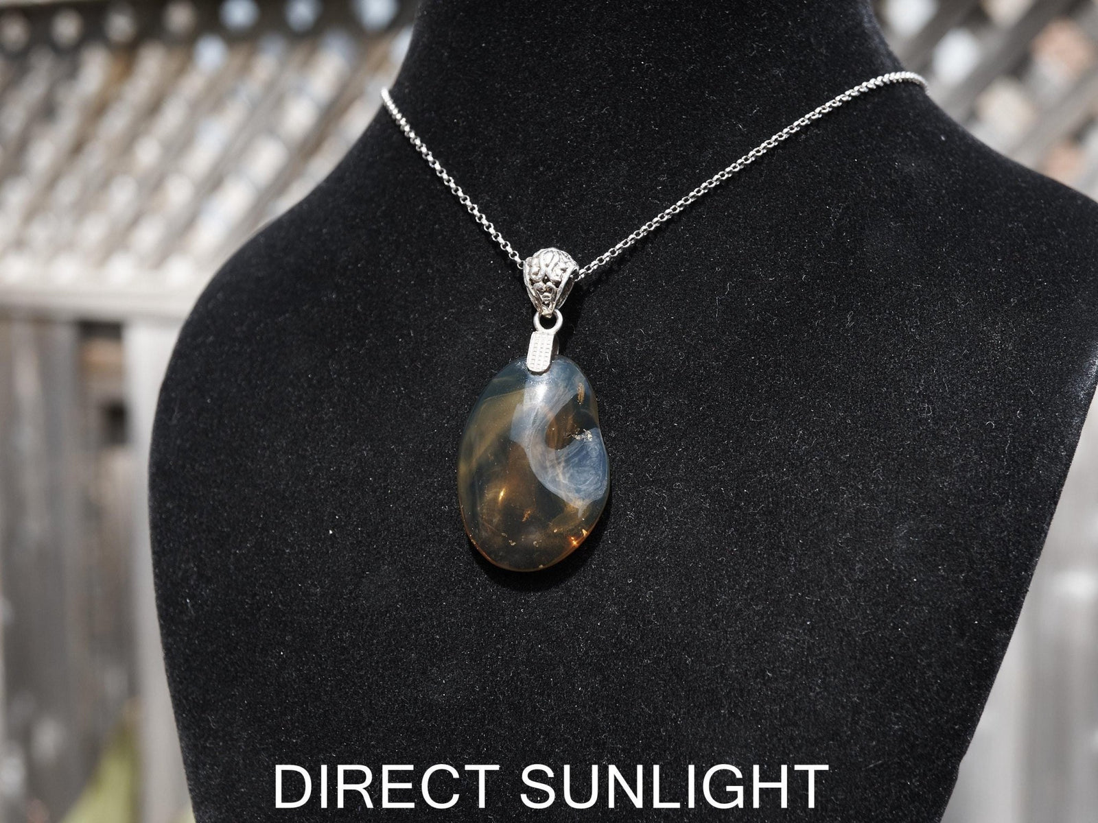 Rare Blue Amber Pendant - 925 Sterling Silver Bail - Larimar Creations