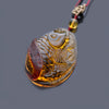 Dominican Green Amber Koi Fish Red Nugget Skin