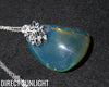 Blue Amber Dominican Pendant Necklace with 925 Silver Flowers